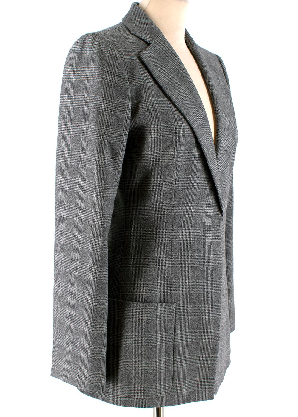 Giorgio Armani Grey Checkered Wool Single Breasted Blazer Jacket

-Made of soft textured wool 
-Gorgeous Prince of Wales checkered pattern 
-Grey neutral hues 
-Classic single breasted cut 
-Pockets to the front 
-Fully lined 
-Button fastening to
