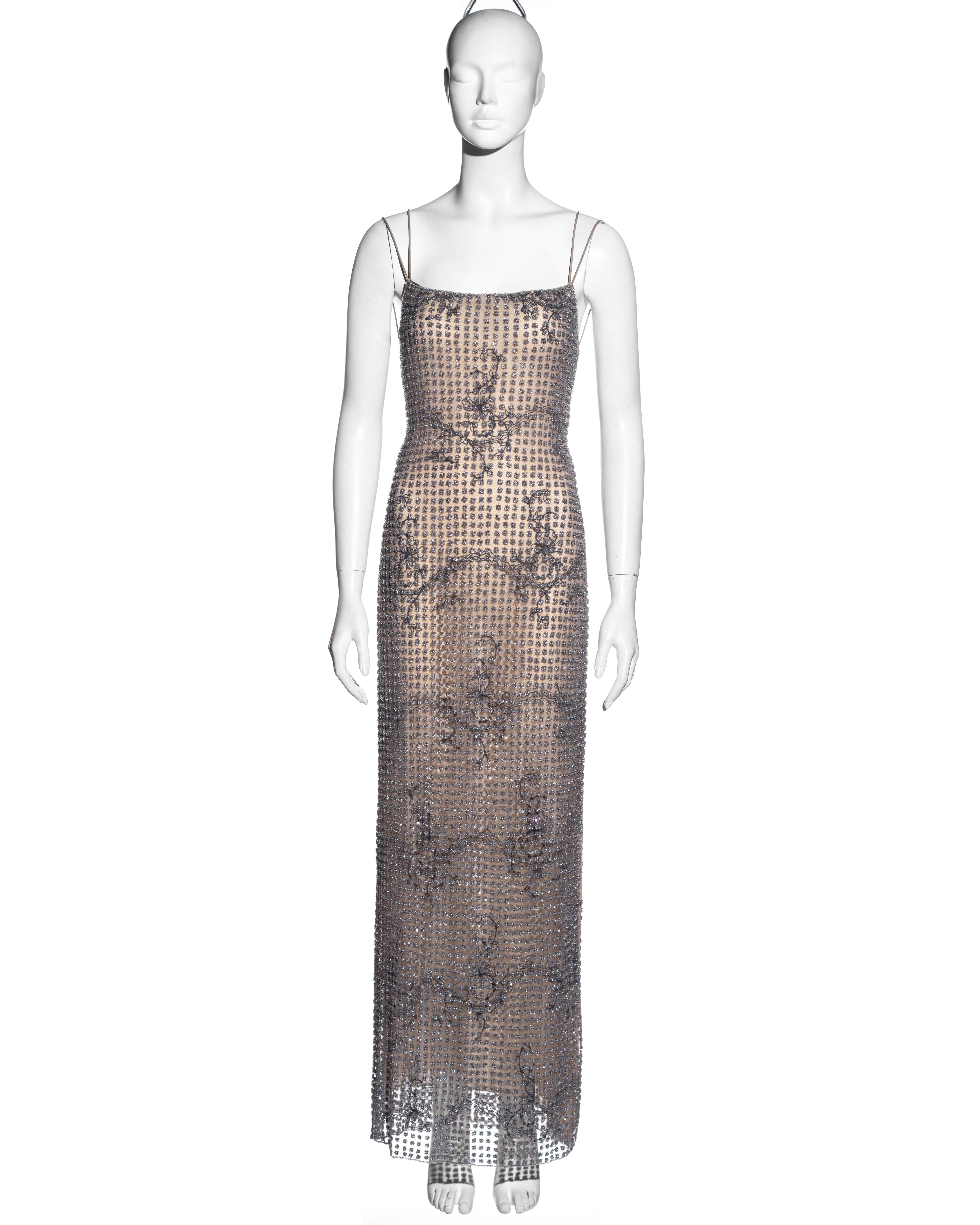▪ Giorgio Armani lavender beaded tulle evening dress
▪ Outer tulle layer adorned all over with small beaded flowers of bugle beads and sequins 
▪ Nude lining with embroidery of flowers and vines 
▪ 4 spaghetti straps
▪ Heavyweight 
▪ IT 40 - FR 36 -