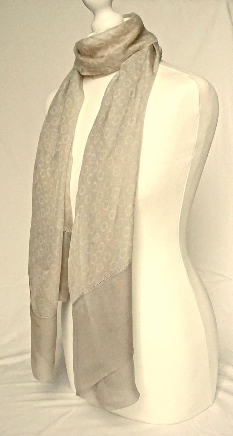 Long Giorgio Armani Le Collezioni silk chiffon scarf featuring a lovely circles print. The scarf has light beige circles on a darker warm beige background. Measuring length 168cm / 66.14 inches by width 64cm / 25.19 inches. The scarf is in very good