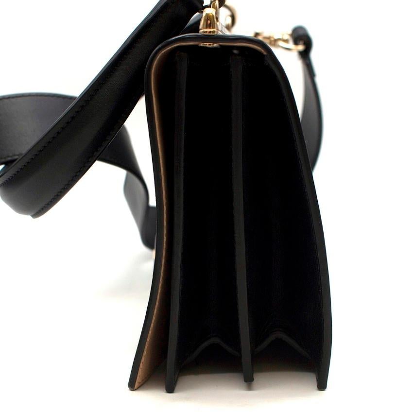 Black Giorgio Armani Leather bag W/ plexiglass turnlock