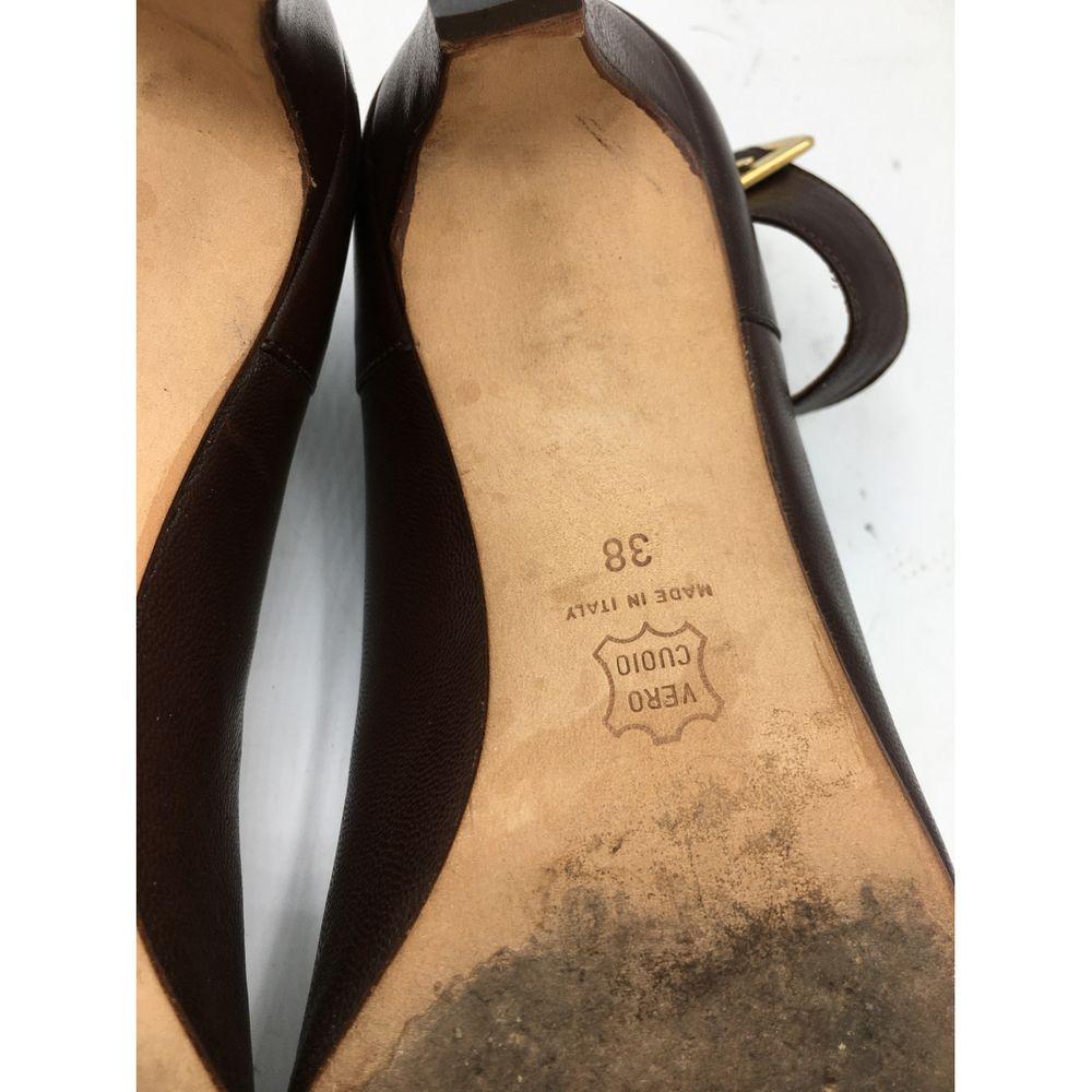 Black Giorgio Armani Leathers Sandals in Brown