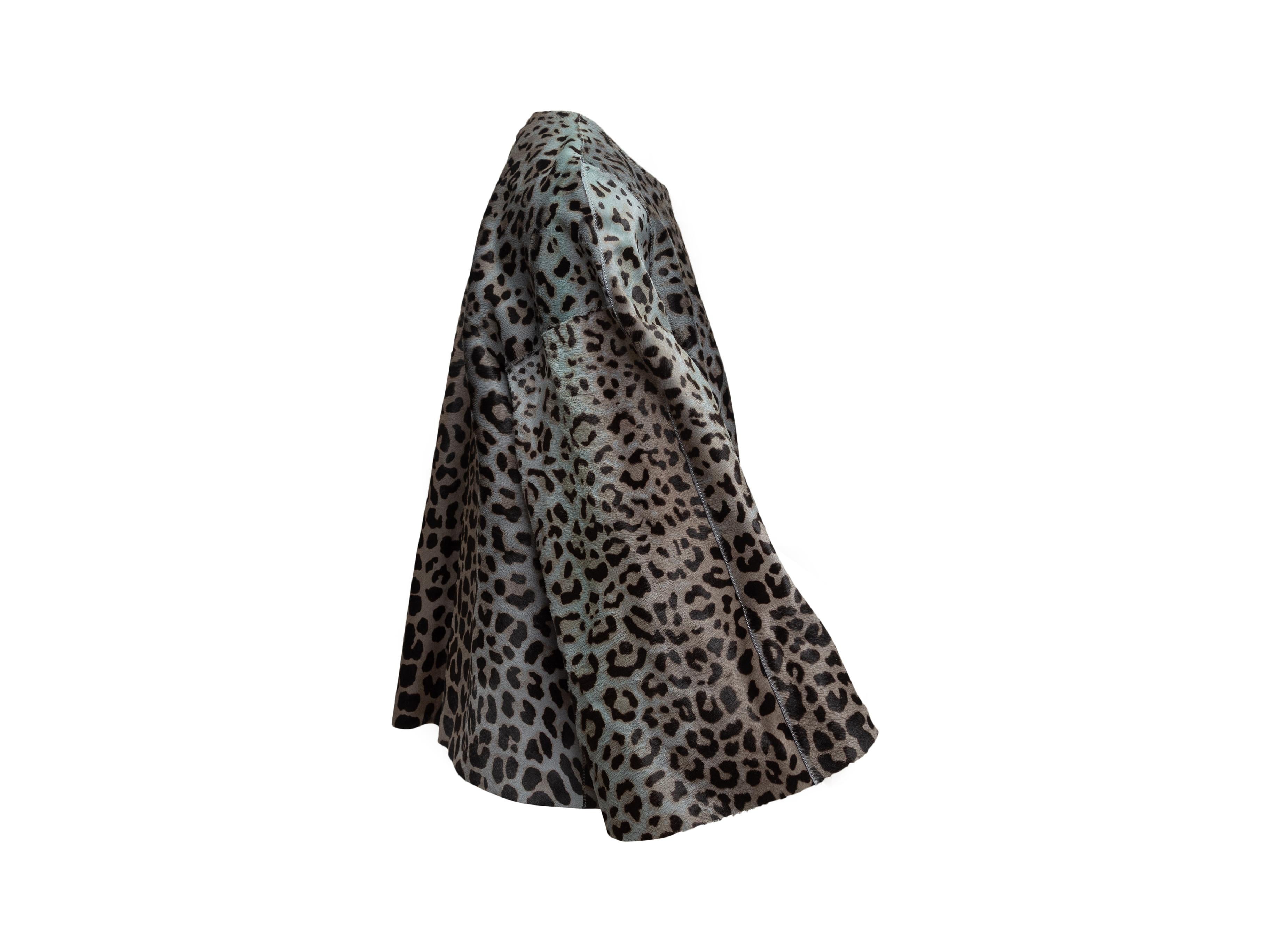 Product details: Light blue, black and tan ponyhair jacket by Giorgio Armani. Leopard print throughout. Crew neck. Concealed closures at front. 39