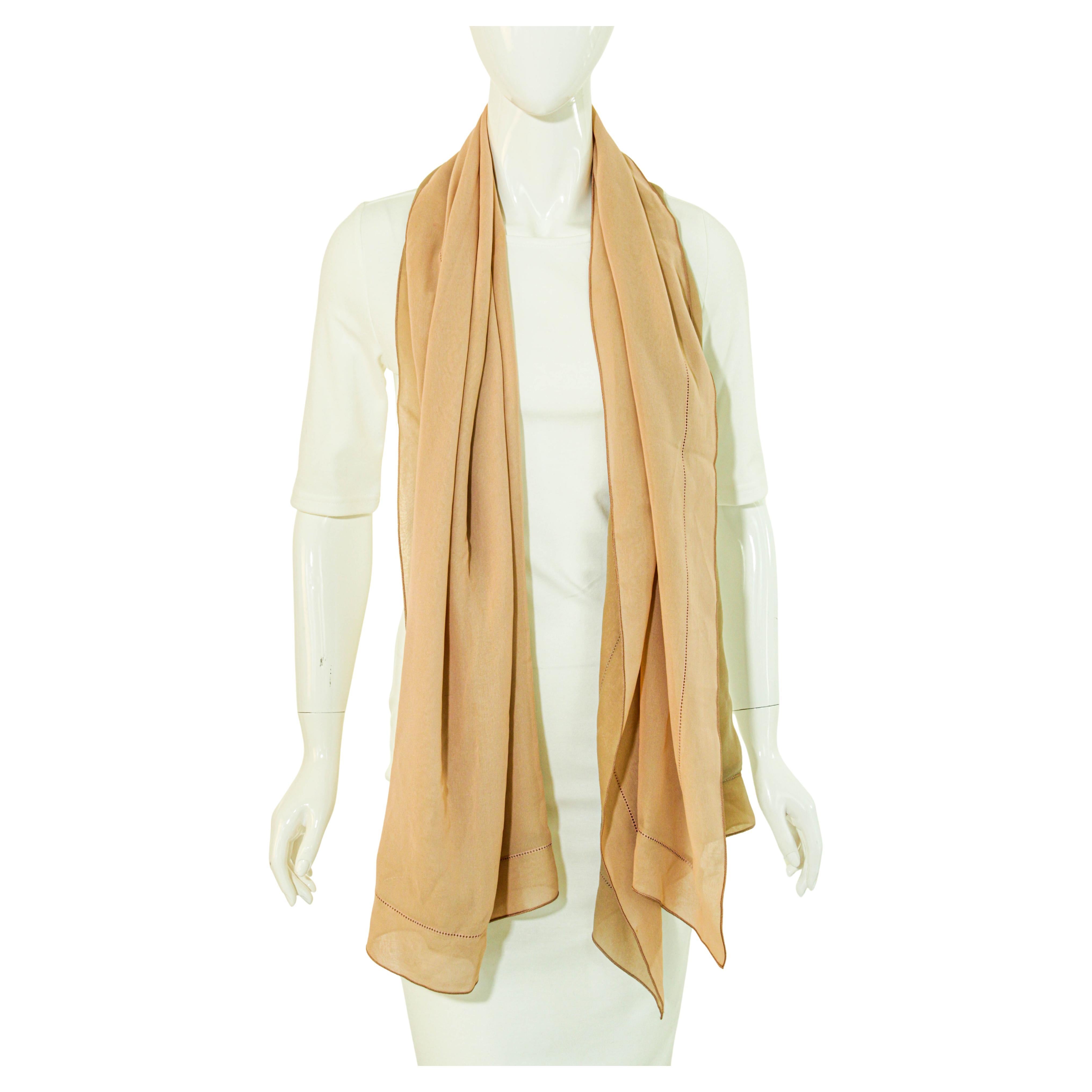 Giorgio Armani Milano Italy Long Silk Chiffon Beige Scarf.
Long GIORGIO ARMANI silk chiffon scarf  with light beige in one side and another lighter color in the other side. 
Armani large silk stole measuring: length 69 inches by width 25.inches.