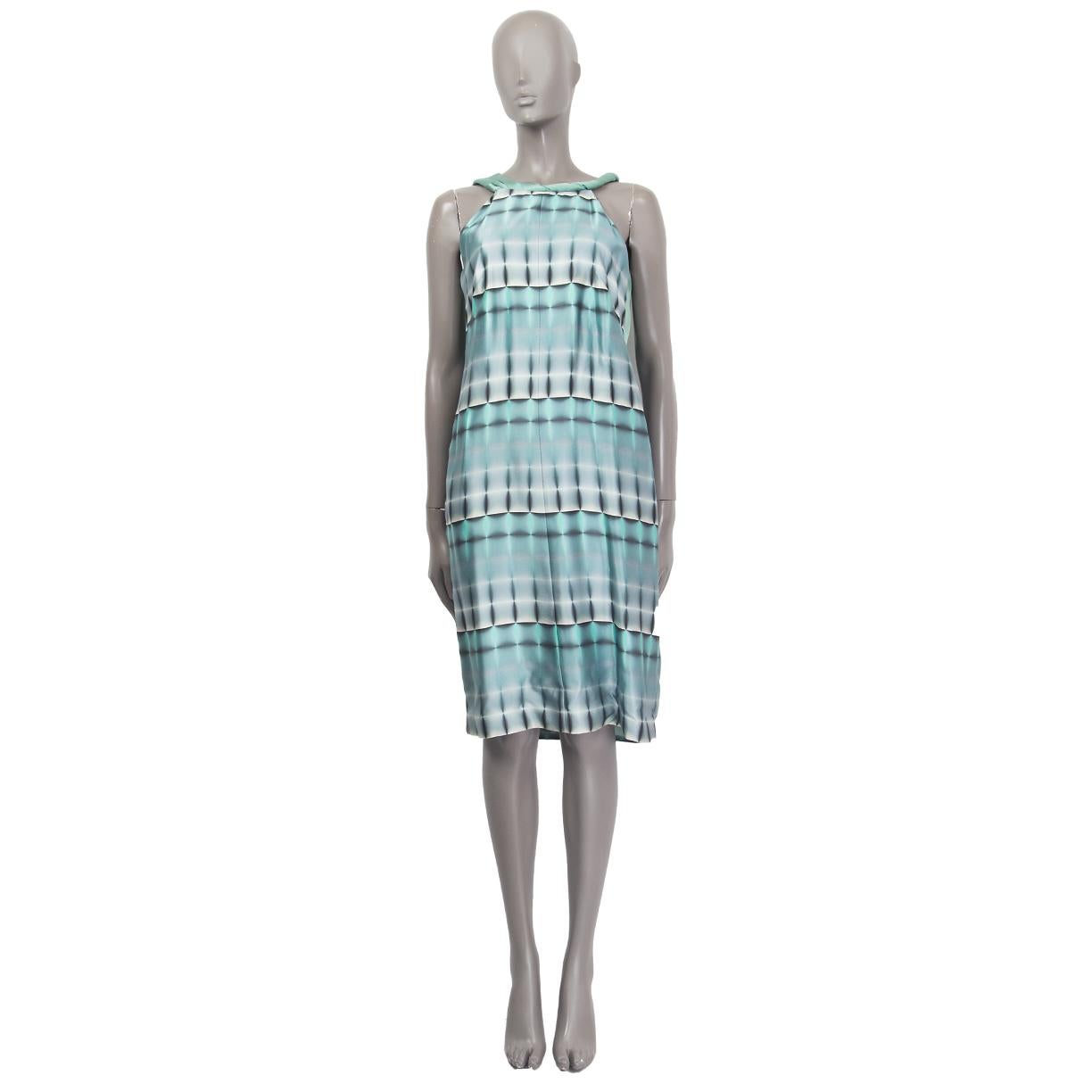100% authentic Giorgio Armani sleeveless shift dress in tie-dye greyish blue and mint green satin (content tag has been removed - feels like silk) with twisted neckline. Opens with a zipper on the side. Lined in propably silk. Has been worn and is