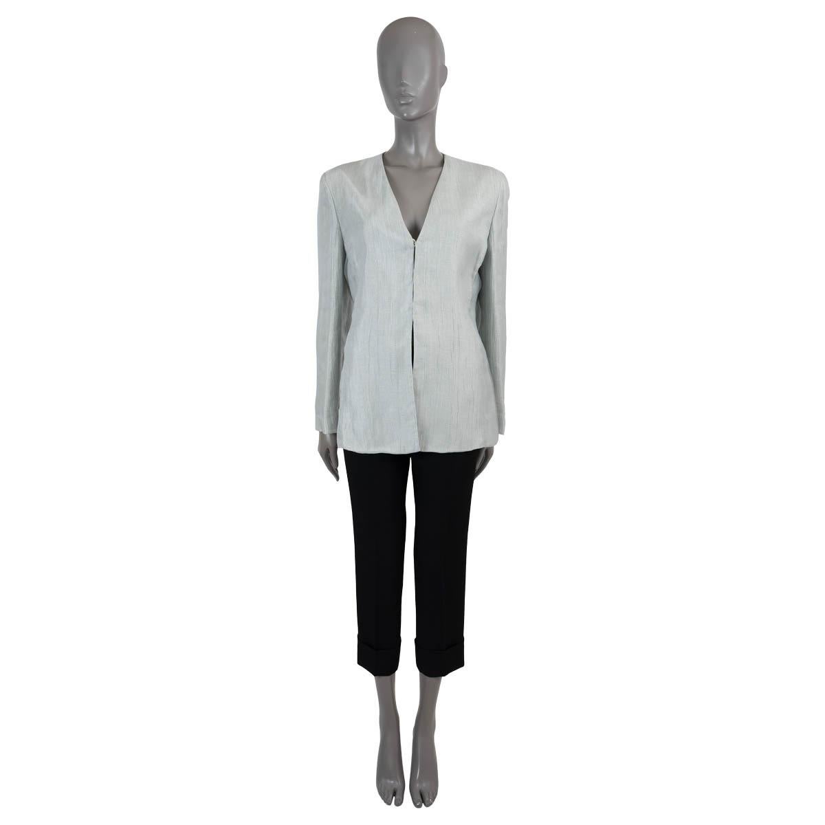 100% authentic Giorgio Armani collarless blazer in irregular textures pale mint green linen (53%), silk (27%), viscose (20%) with a shiny sheer tulle-like layer on top. Features a V-neck and straight hem. Closes with concealed buttons on the front