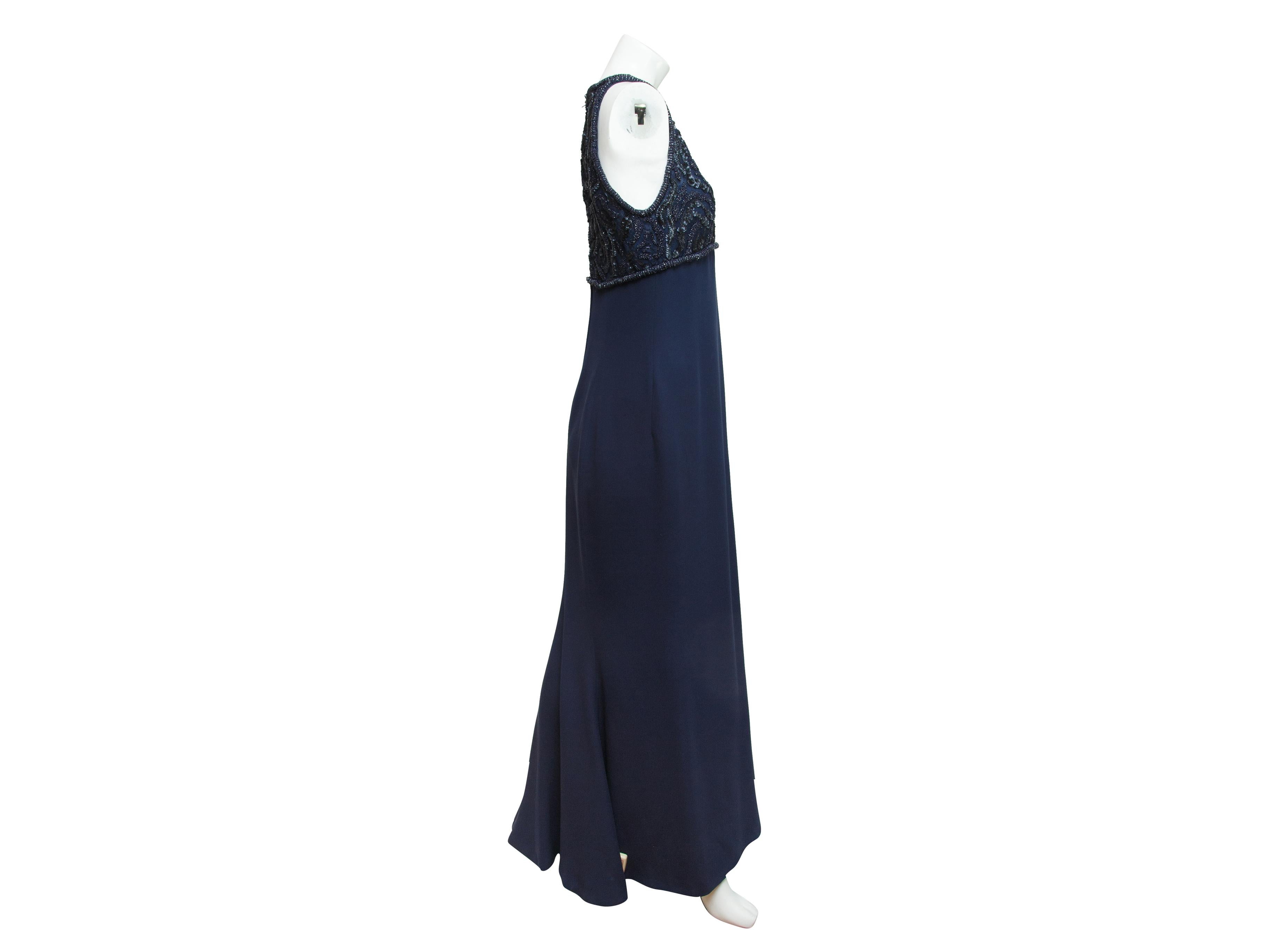 Product details:  Navy blue embellished gown by Giorgio Armani.  Roundneck.  Sleeveless.  Beaded bodice.  Concealed back zip closure.  32