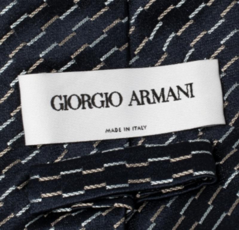 This tie from Giorgio Armani is perfect to add to your collection! The navy blue creation is made of 100% silk and features diagonal stripes all over. It comes with the brand label neatly stitched at the back.