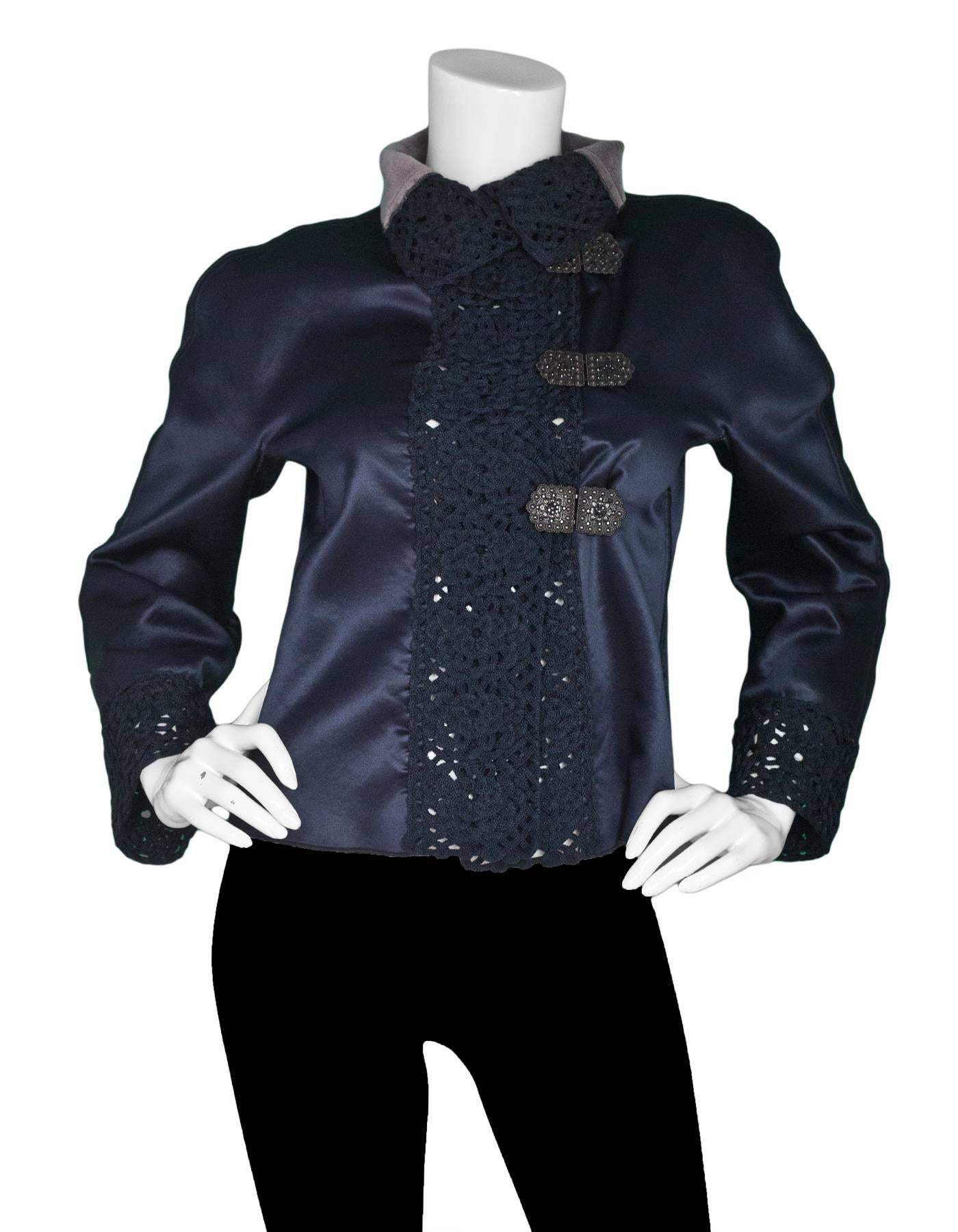 Giorgio Armani Navy Satin & Crochet Trim Jacket Sz IT40
Features crocheted trim and jeweled buttons

Made In: Italy
Color: Navy
Composition: Not listed, believed to be silk-blend
Lining: Grey textile
Closure/Opening: Front hook and eye button