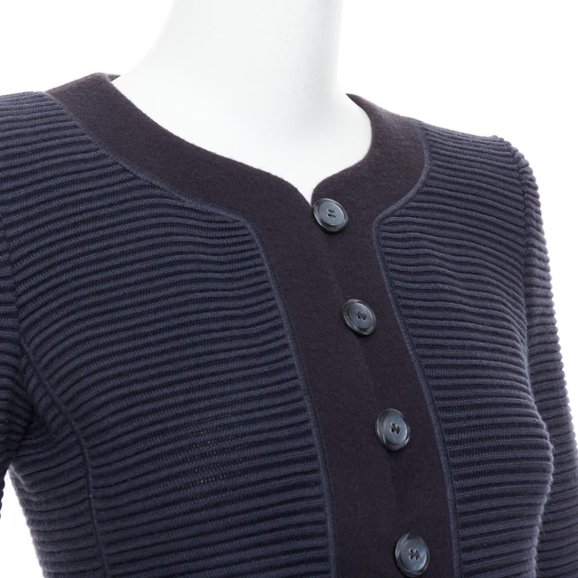 GIORGIO ARMANI navy wool silk cashmere padded knit slim fit jacket IT40 S
Reference: CC/A00406
Brand: Giorgio Armani
Material: Wool, Silk, Cashmere
Color: Navy
Pattern: Solid
Closure: Button
Extra Details: Button and loop closure.
Made in: