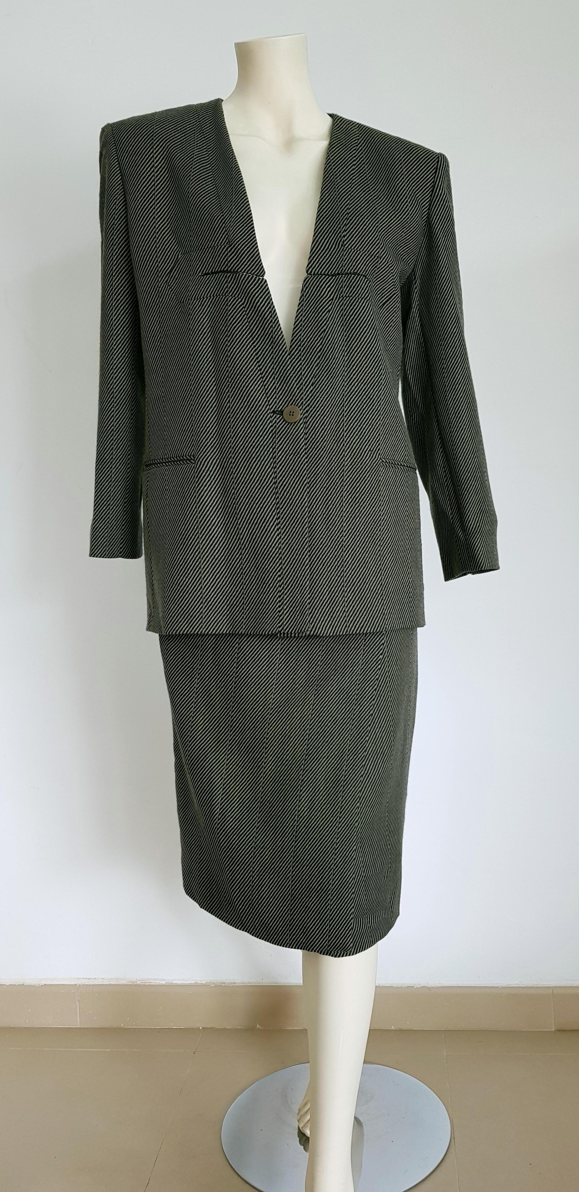 Giorgio ARMANI dark grey and light grey diagonal lines, jacket and skirt wool suit - Unworn, New.

SIZE: equivalent to about Small / Medium, please review approx measurements as follows in cm. 
JACKET: lenght 75, chest underarm to underarm 50, bust