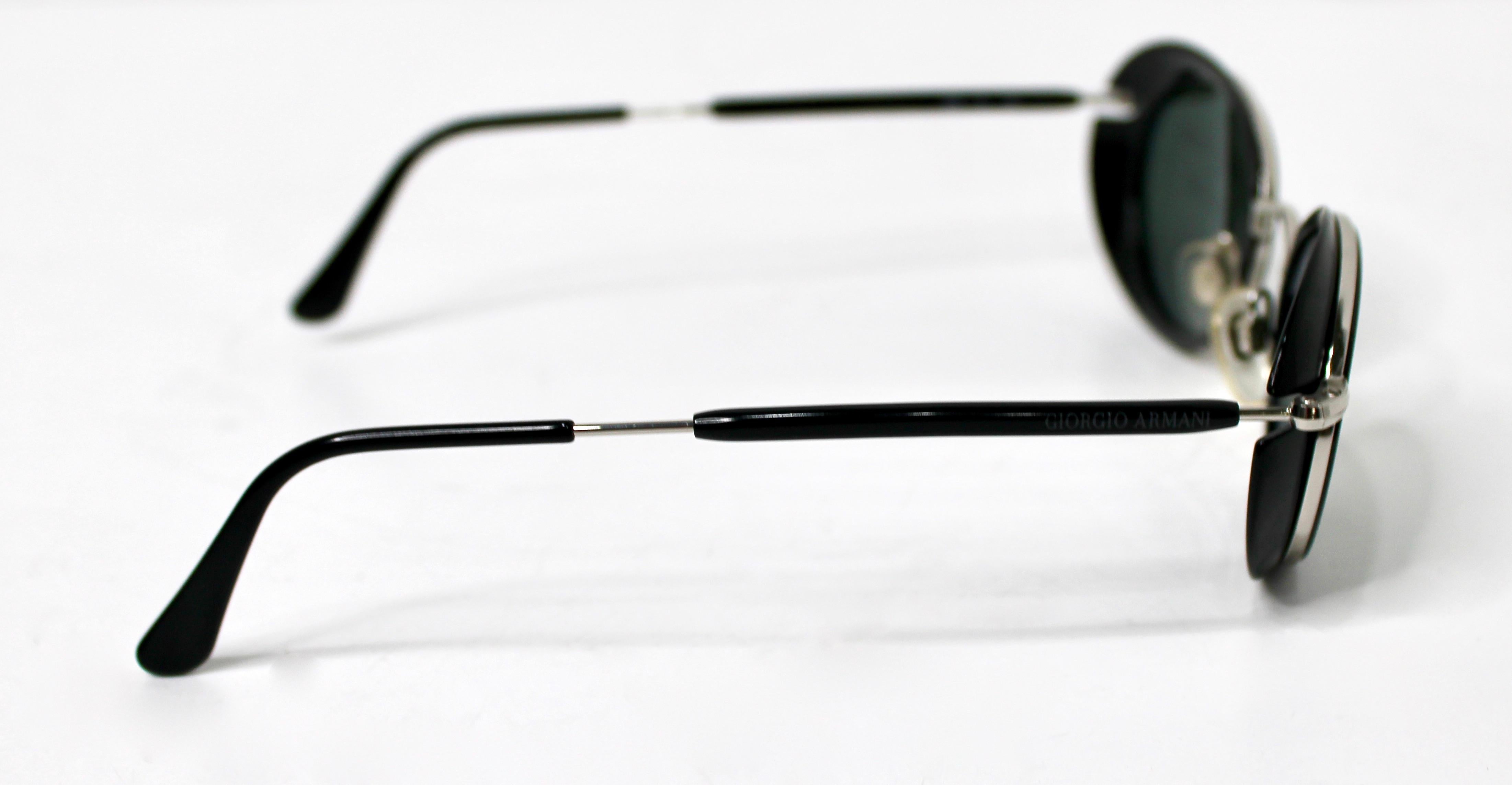 Occhiali da sole ovali Giorgio Armani, neri e argentati, circa anni '90 in vendita 1