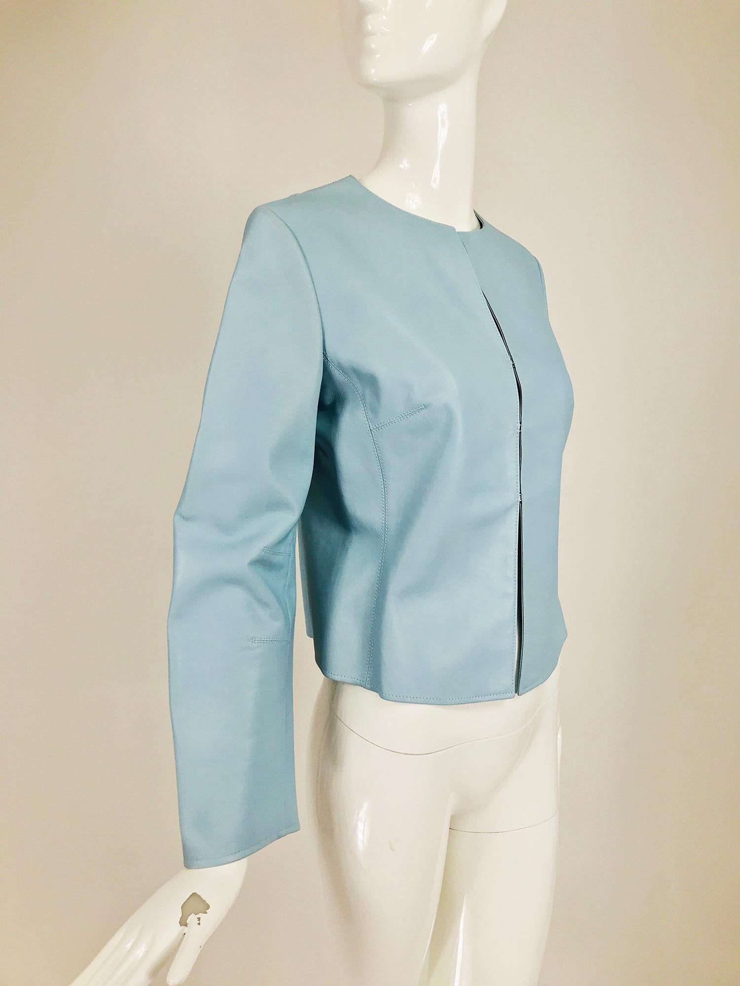 Giorgio Armani pale blue lambskin jacket. Jewel neckline, long sleeves, top stitch detail. Soft lambskin with bonded lining, finished seams inside. Looks barely, if ever, worn.Closes at the front with large silver hook and eyes.  Marked size 40.
   