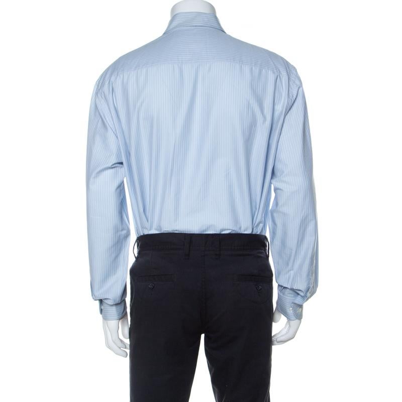 Express your unique style with this shirt from Giorgio Armani. It is made from breathable cotton and features long sleeves and a striped pattern all over. A pair of well-tailored pants and oxford shoes will complement this pale blue shirt on any