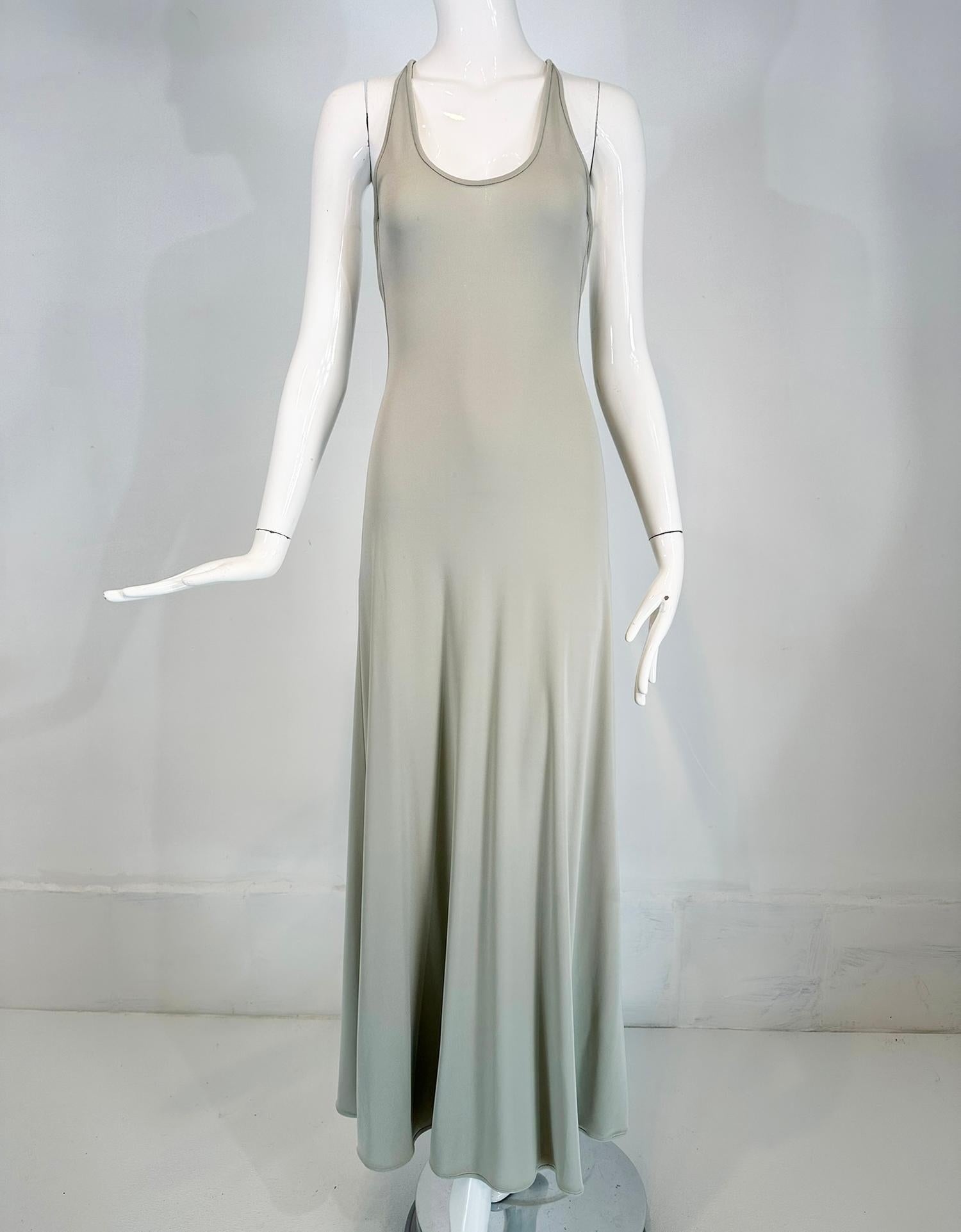 Giorgio Armani pale grey bias jersey, halter neck, open back maxi dress. Silky mid weight rayon blend jersey maxi dress pulls on. Halter neck, the back has skinny straps that knot at the center. The dress is fitted through the torso and flairs from