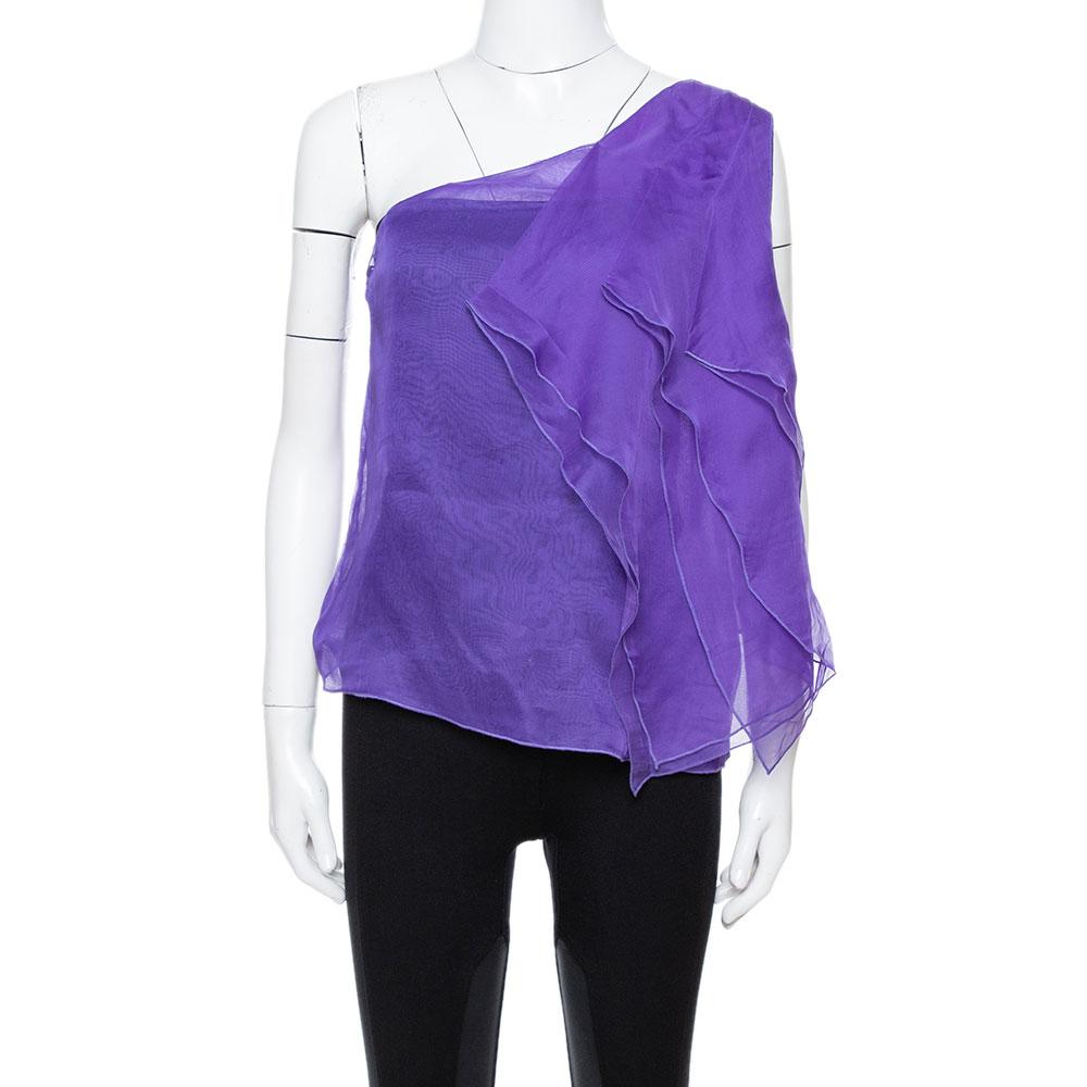 Cut to a stylish silhouette with one shoulder design, this Giorgio Armani top is a must-have. It comes in purple with a cascading fall of pleats. The top will work with jeans or trousers, high heels, and a small shoulder bag.

