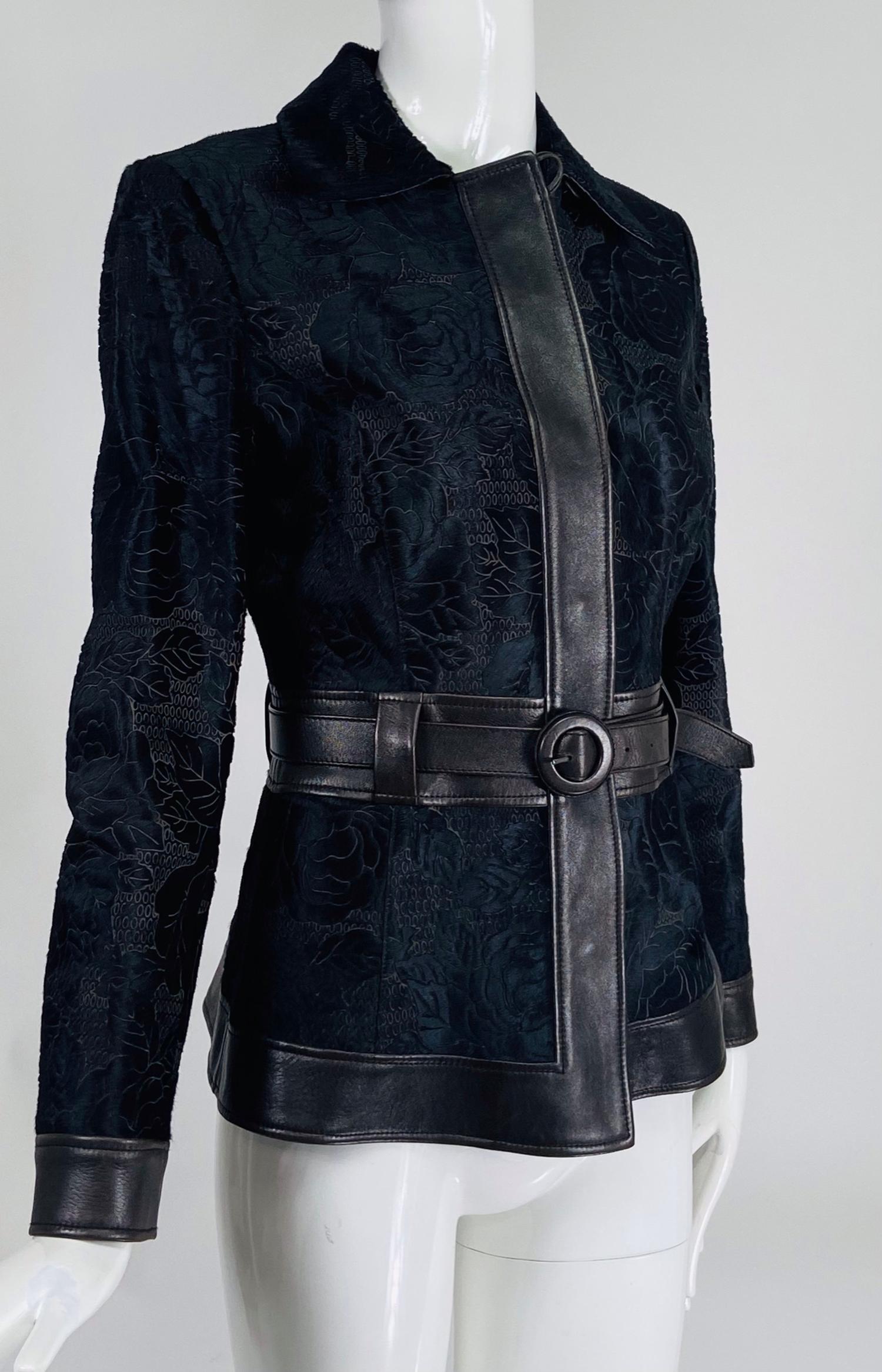 Giorgio Armani sheared lamb with leather facings in black & brown belted jacket.  This stylish jacket is created of fine sheared black lamb that is shaved in a design of  roses with leaves throughout the jacket, it shows the design in brown. The
