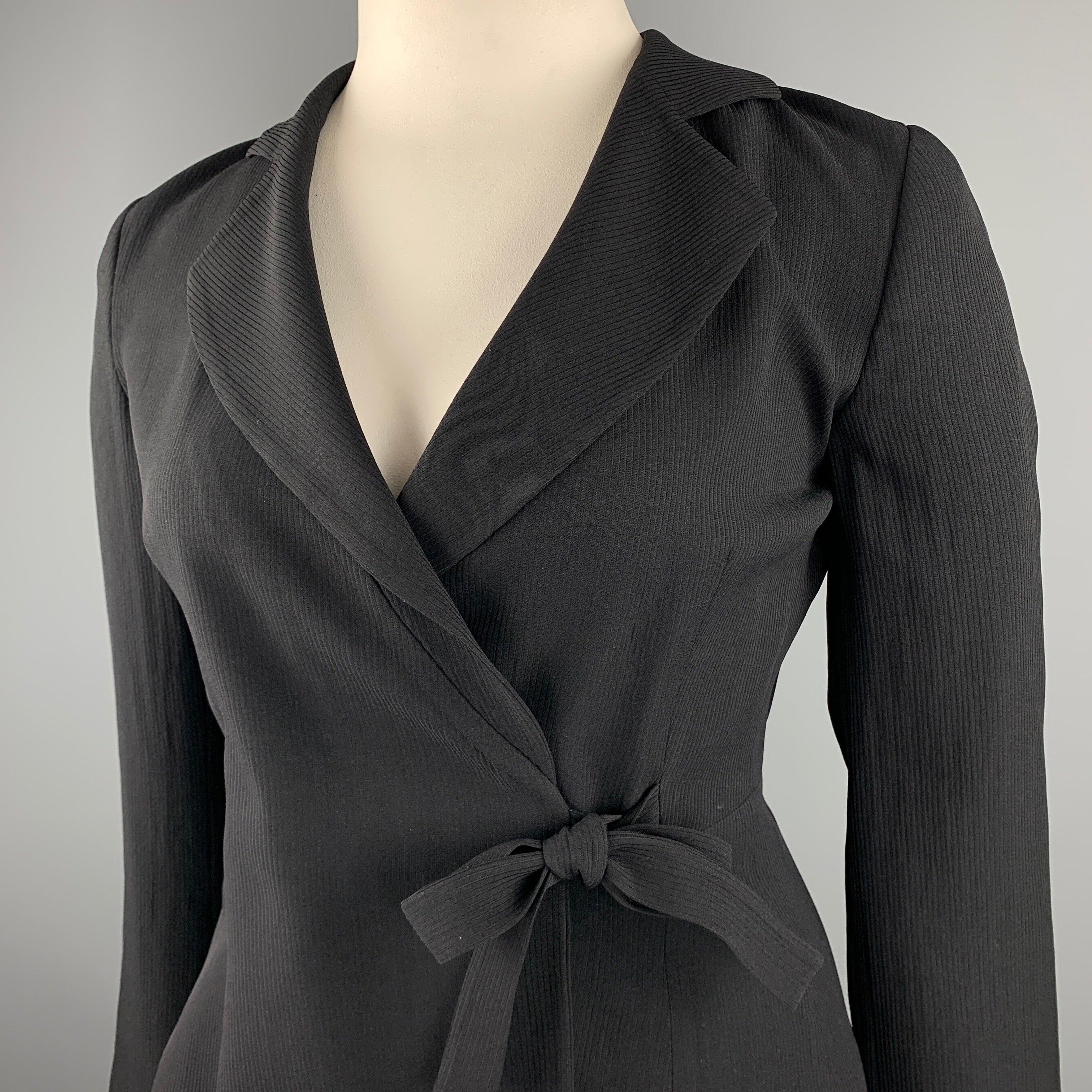GIORGIO ARMANI jacket comes in a black ribbed triacetate blend with a full liner featuring a notch lapel, tie at waist detail, and a single button closure.
Very Good
Pre-Owned Condition. 

Marked:   IT 44 

Measurements: 
 
Shoulder: 16 inches Bust: