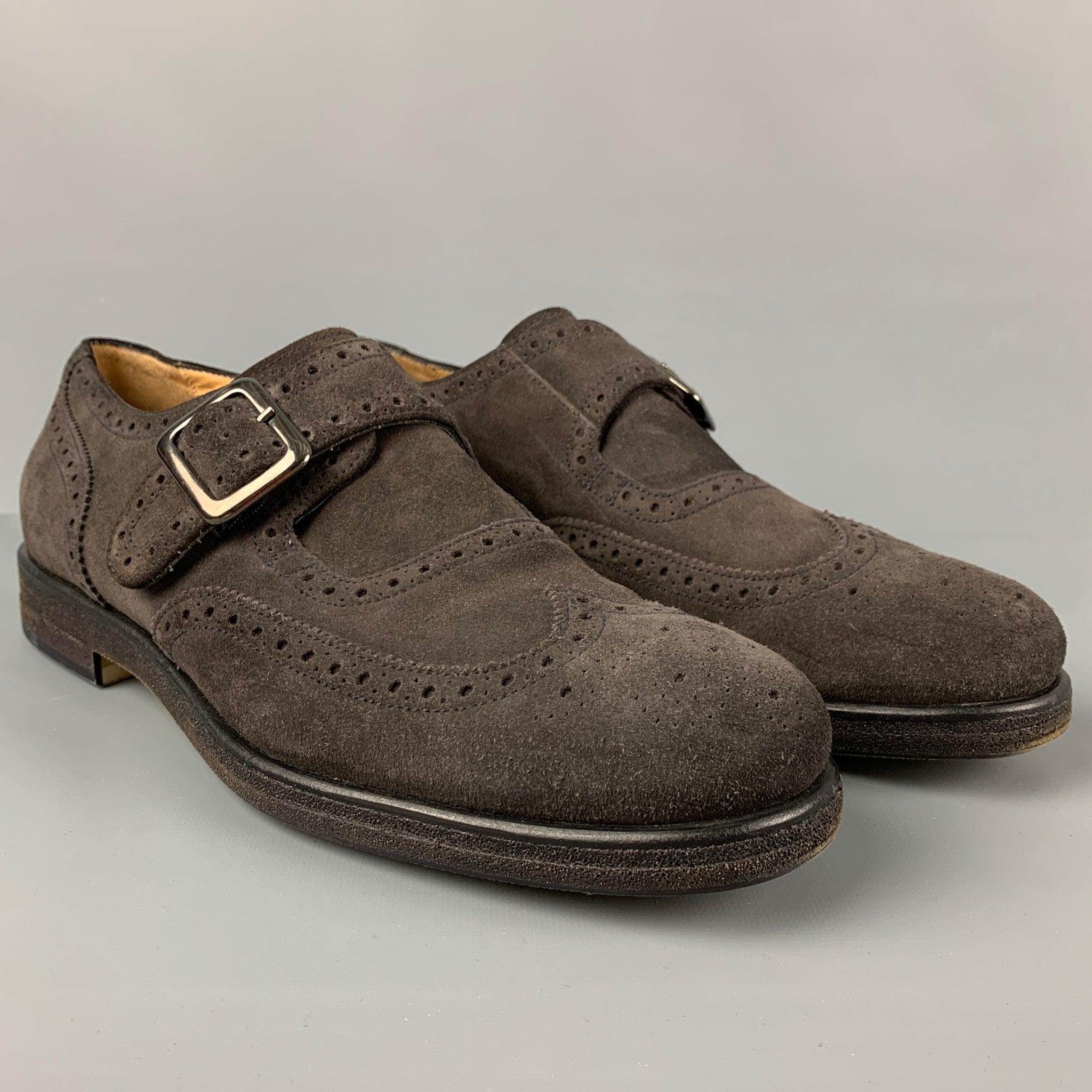 GIORGIO ARMANI loafers comes in a brown perforated suede featuring a round toe and a monk strap. Made in Italy.
Very Good
Pre-Owned Condition. 

Marked:   10 / X2L029Outsole: 12.5 inches  x 4.25 inches 
  
  
 
Reference: 115719
Category: