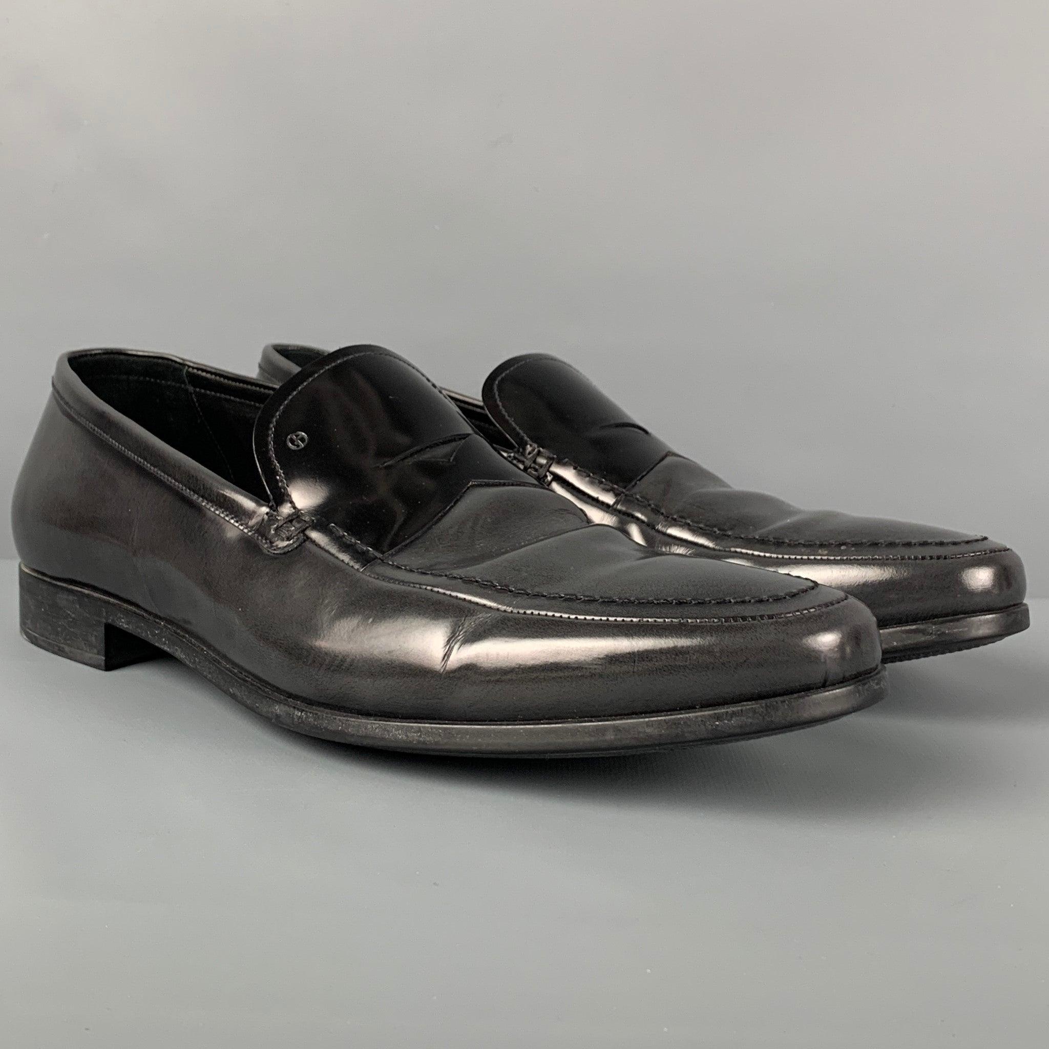 GIORGIO ARMANI loafers comes in a charcoal & black ombre leather featuring a slip on style. Comes with box. Made in Italy.
Very Good
Pre-Owned Condition. 

Marked:   10Outsole: 12.5 inches  x 4 inches 
  
  
 
Reference: 118379
Category:
