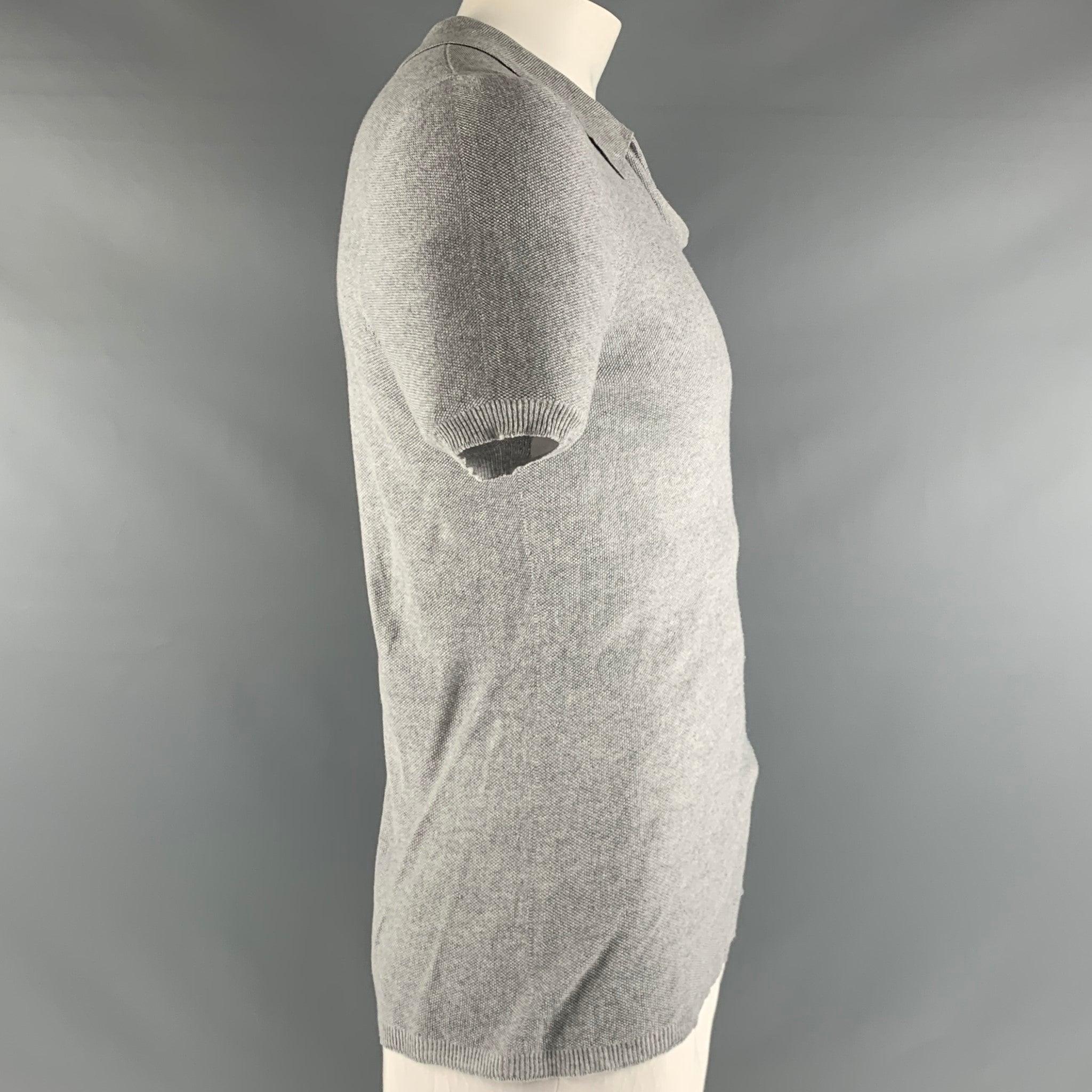 GIORGIO ARMANI top in a grey silk fabric featuring short sleeves and unstructured spread collar. Made in Italy. Excellent Pre-Owned Condition. 

Marked:   IT 48 

Measurements: 
 
Shoulder: 17.5 inches  Chest: 40 inches  Sleeve: 10 inches  Length: