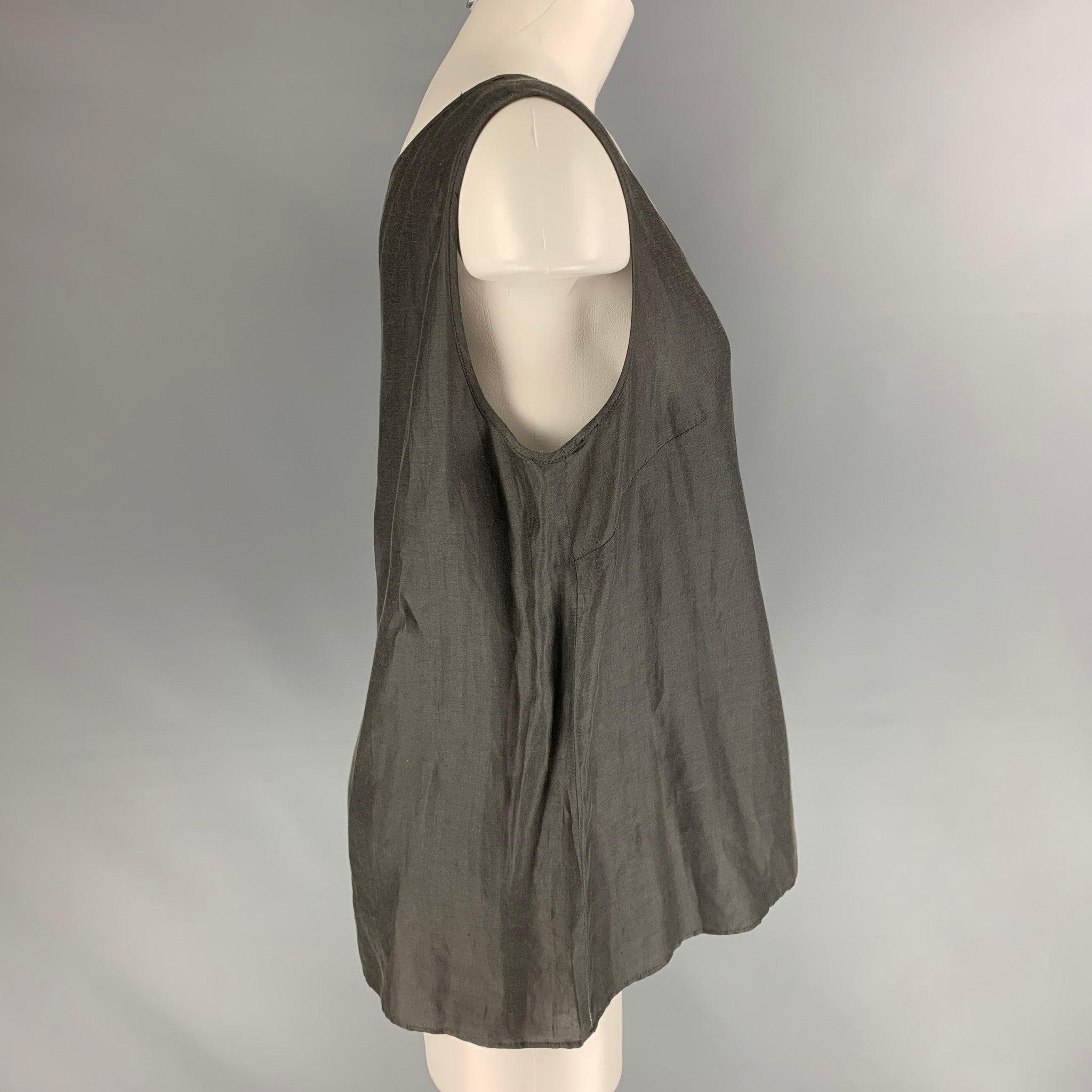 GIORGIO ARMANI sleeveless blouse comes in a slate linen and silk featuring a round neck. Made in Italy.Excellent Pre-Owned Condition. 
 

 Marked:  12 
 

 Measurements: 
  
 Shoulder: 15 inches Bust: 43 inches Length: 24 inches  
  
  
  
 Sui