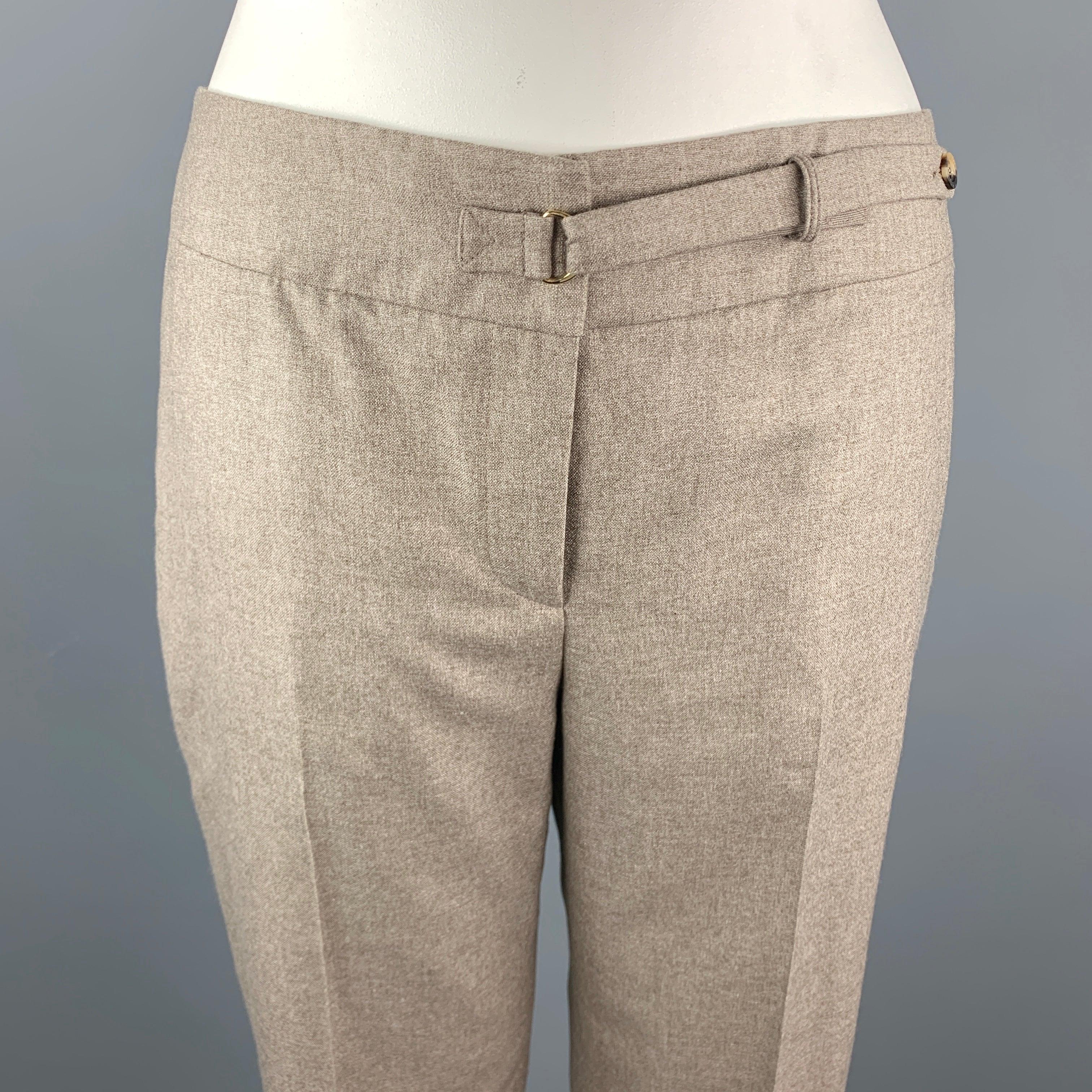 GIORGIO ARMANI Dress Pants
comes in a taupe heather silk / cashmere material, with a flat front, a front tab, seam pockets, and straight legs. Made in Italy.
Excellent Pre-Owned Condition. 

Marked:   IT 52 

Measurements: 
  Waist: 35 inches 
Rise: