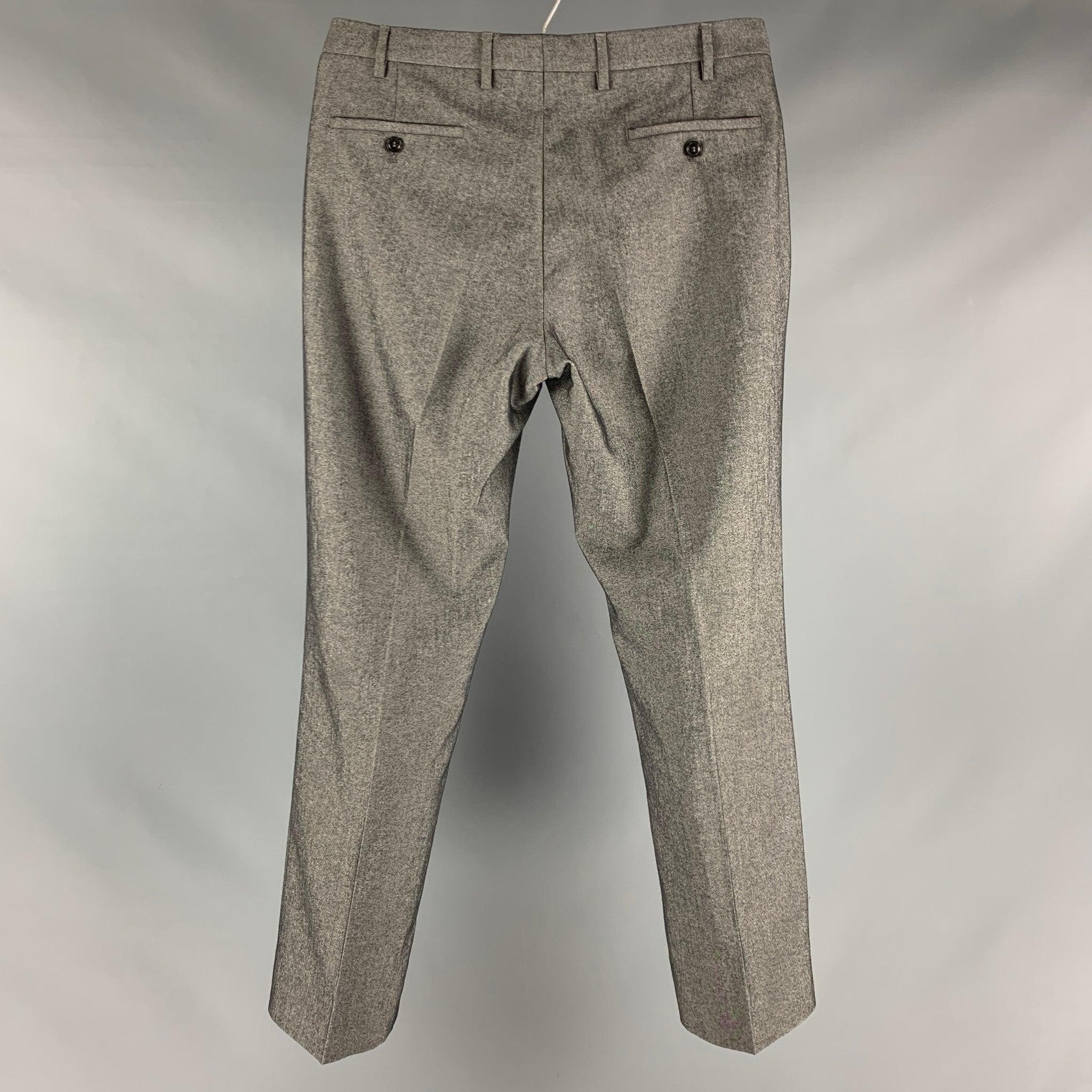 GIORGIO ARMANI dress pants comes in a grey wool
 featuring a flat front and a zip fly closure. Made in Italy.Excellent Pre-Owned Condition. 

Marked:  

Measurements: 
 Waist: 34 inches Rise: 8.5 inches Inseam: 32 inches Leg Opening: 18 inches 
 
 
