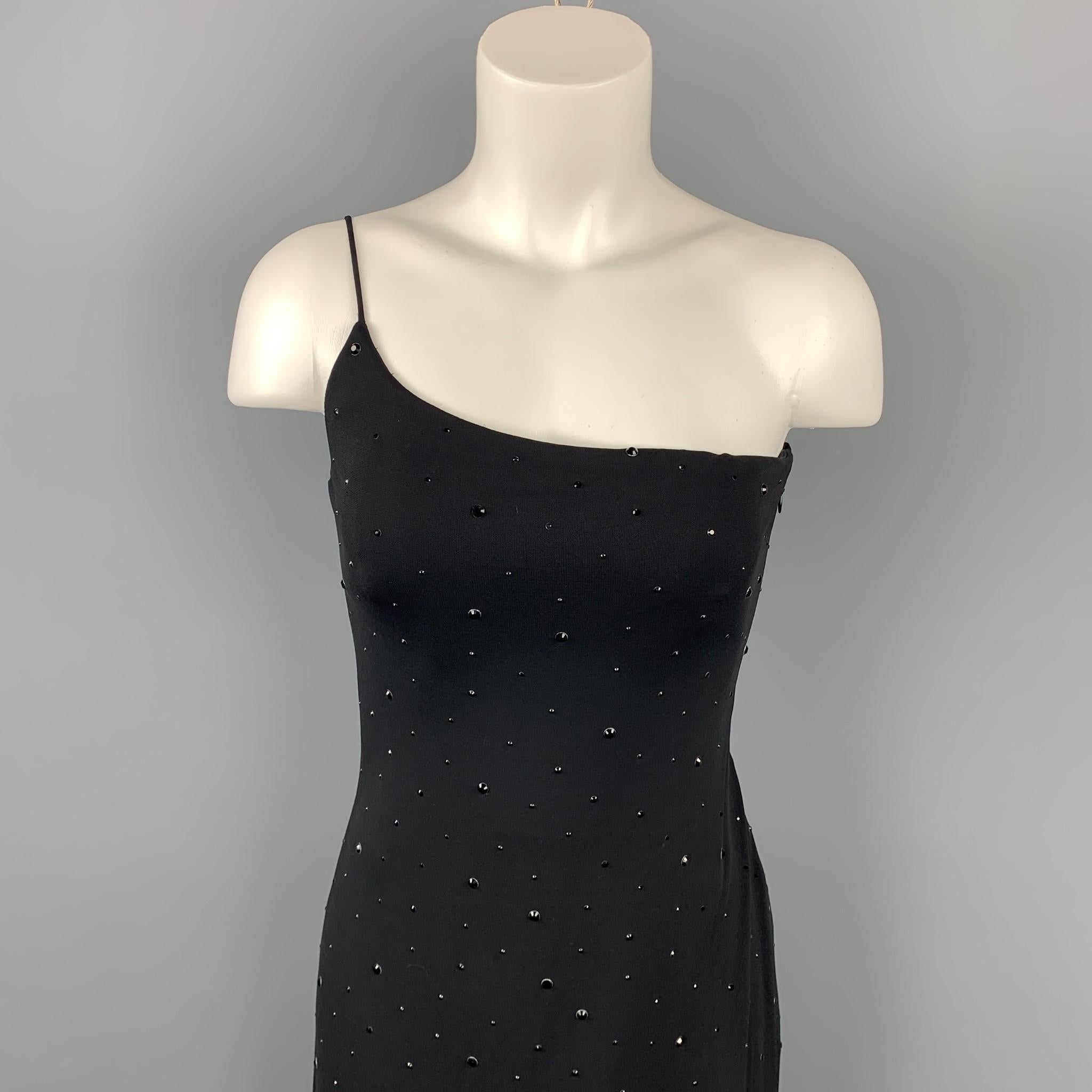 GIORGIO ARMANI dress comes in a black beaded material featuring a shift style, spaghetti straps, side slit, and a side zipper closure. Made in Italy.

Very Good Pre-Owned Condition.
Marked: 38

Measurements:

Bust: 26 in. 
Waist: 25 in. 
Hip: 30 in.