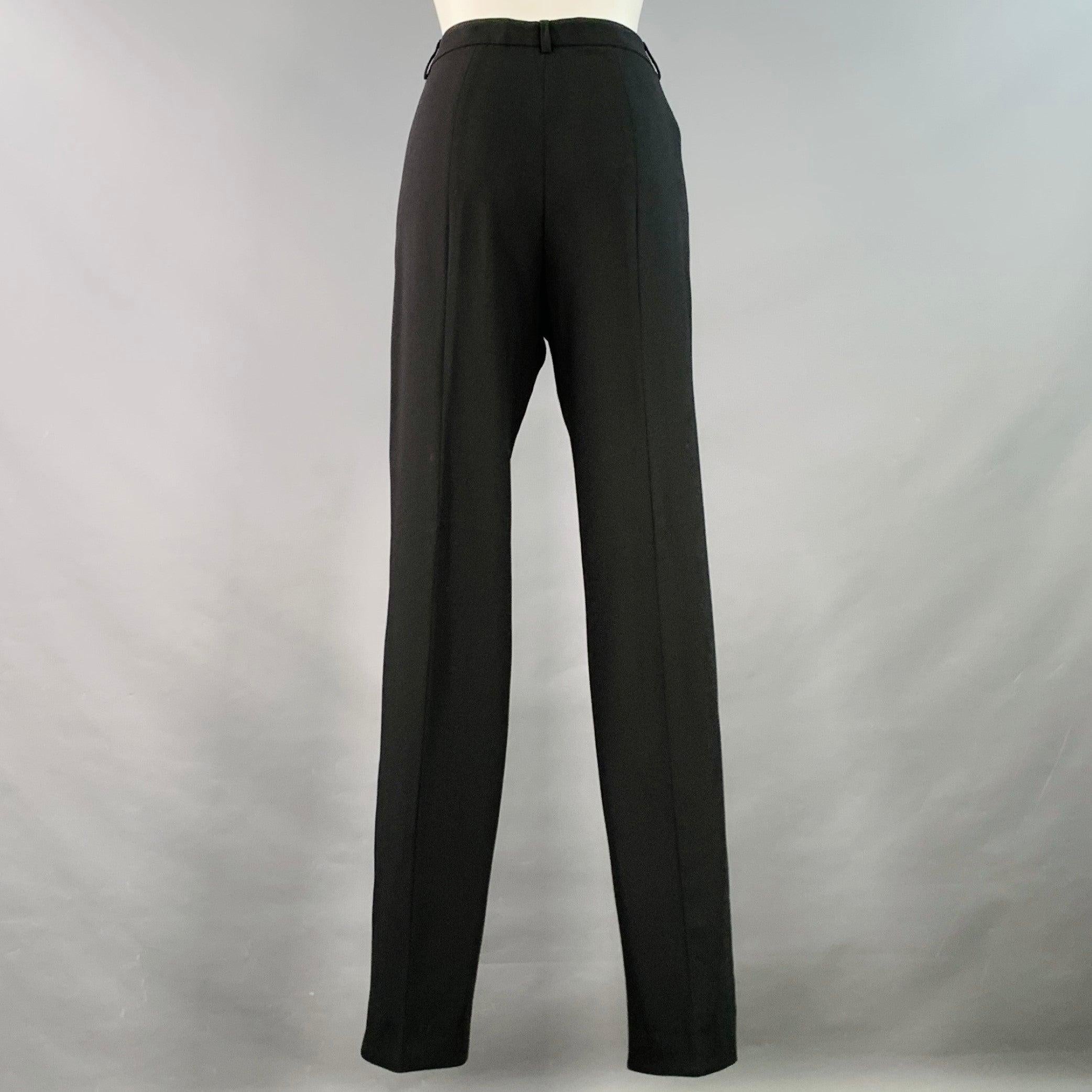 GIORGIO ARMANI Kleid Hose
aus schwarzer Schurwolle mit flacher Vorderseite, spitz zulaufendem Bein und Hosenschlitz mit Reißverschluss. Made in Italy Ausgezeichneter Pre-Owned Zustand. 

Markiert:   IT 40 

Abmessungen: 
  Taille: 30 Zoll Anstieg: