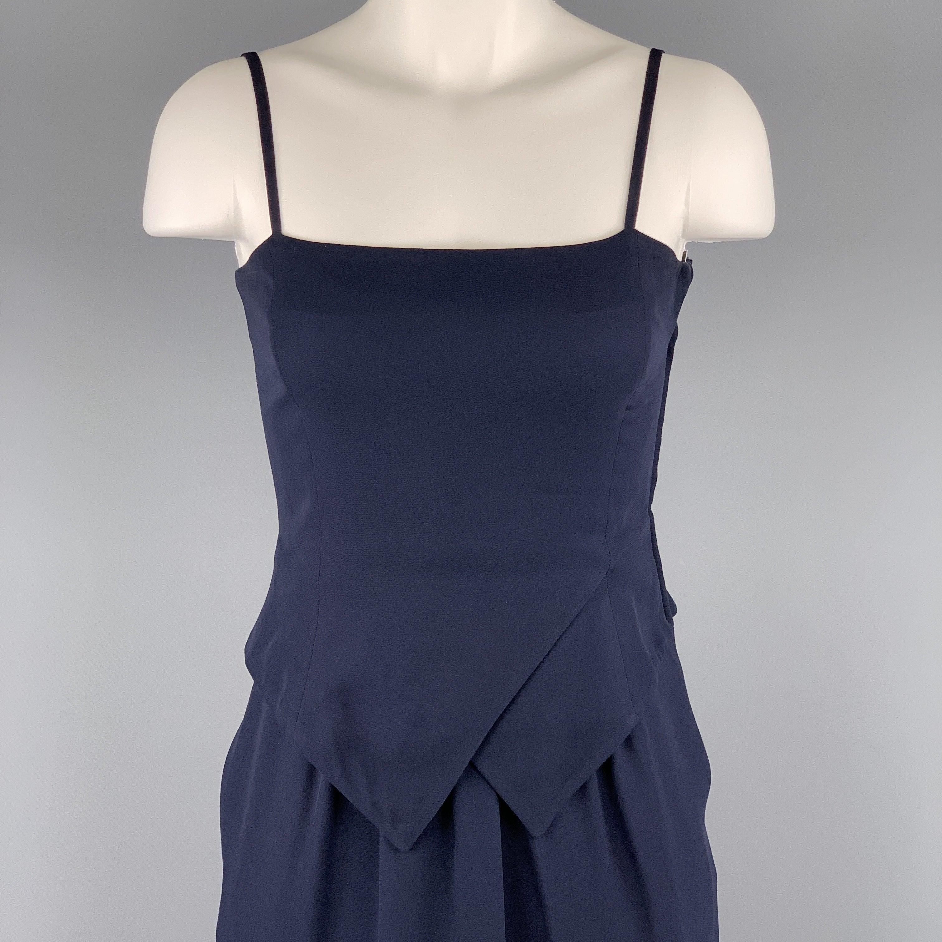 Vintage GIORGIO ARMANI cocktail dress comes in navy blue viscose with a spaghetti strap bustier bodice top, wrap point detailed waistline overlay, and pleated skirt. Made in Italy.Excellent
Pre-Owned Condition. 

Marked:   38/4 

Measurements: 
 