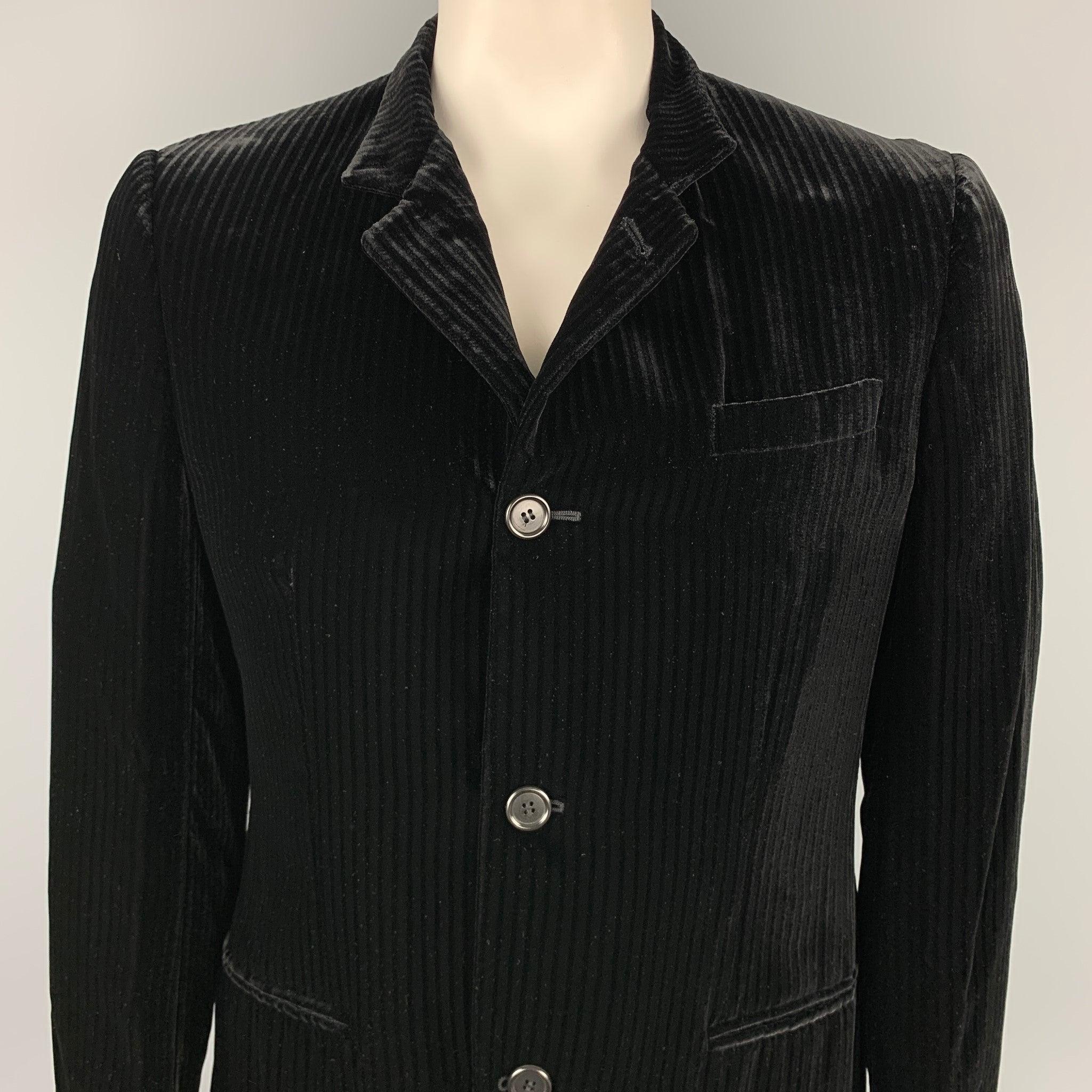 GIORGIO ARMANI jacket comes in a black stripe rayon velvet featuring a spread collar, slit pockets, and a buttoned closure. Made in Italy.Very Good
 Pre-Owned Condition. 
 

 Marked:  IT 54
  
 

 Measurements: 
  
 Shoulder: 18.5 inches Chest: 44