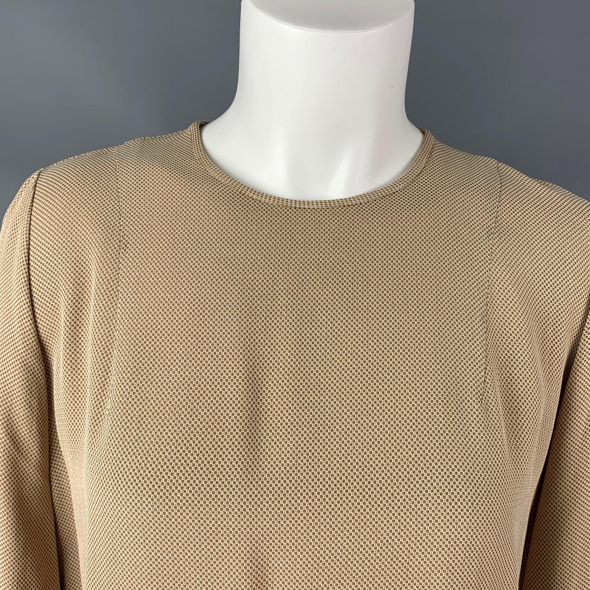 Vintage GIORGIO ARMANI long sleeve blouse comes in beige viscose and acetate fabric features a micro checker / square print, crew neck, quarter button up closure. Made in Italy.Very Good Pre-Owned Condition. 

Marked:   42 

Measurements: 
