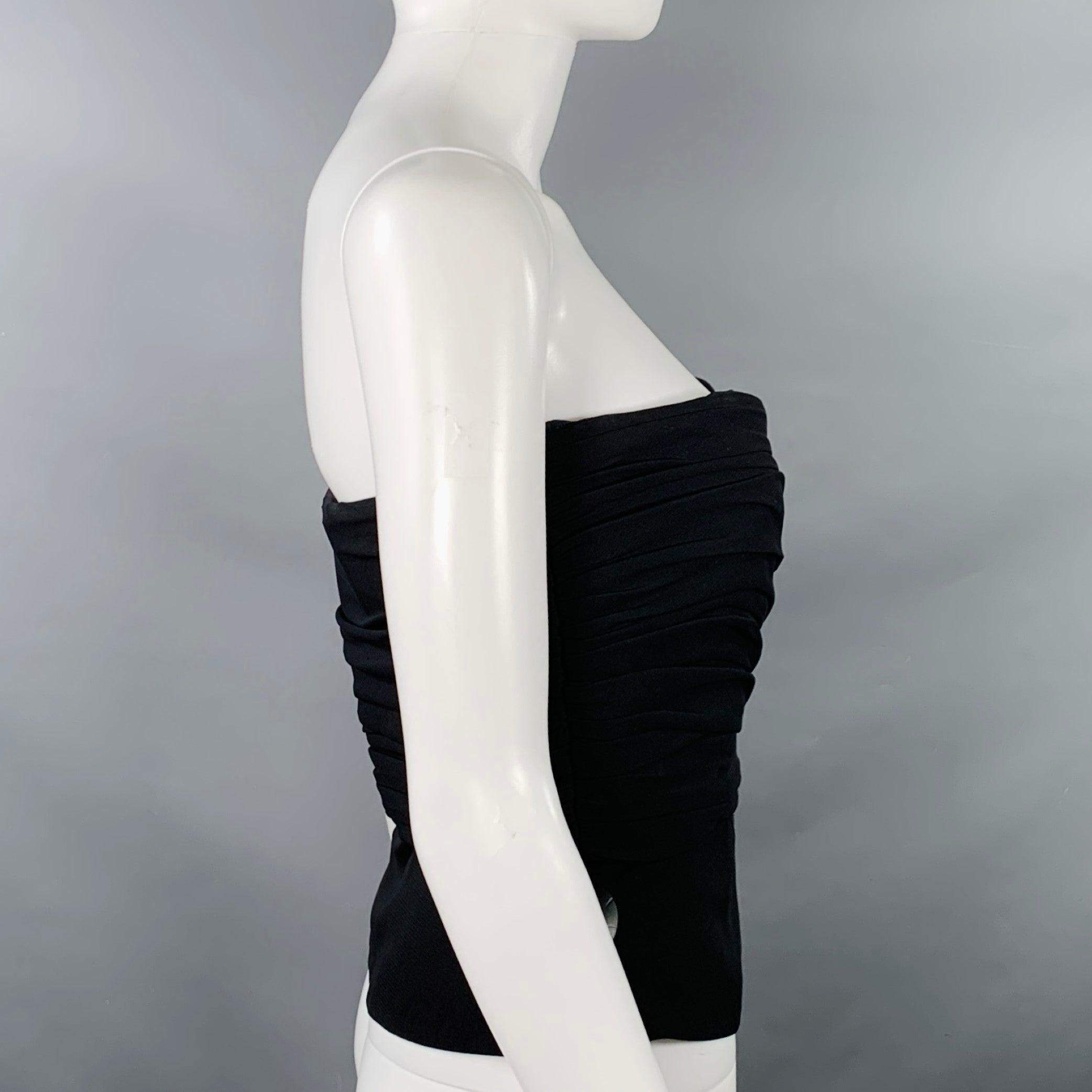 GIORGIO ARMANI dress top in a black fabric featuring a bustier style, ruched appearance, sweetheart neckline, and side zipper closure.Very Good Pre-Owned Condition. Minor signs of wear. Fabric tag removed. 

Marked:   IT 42 

Measurements: 
  Bust: