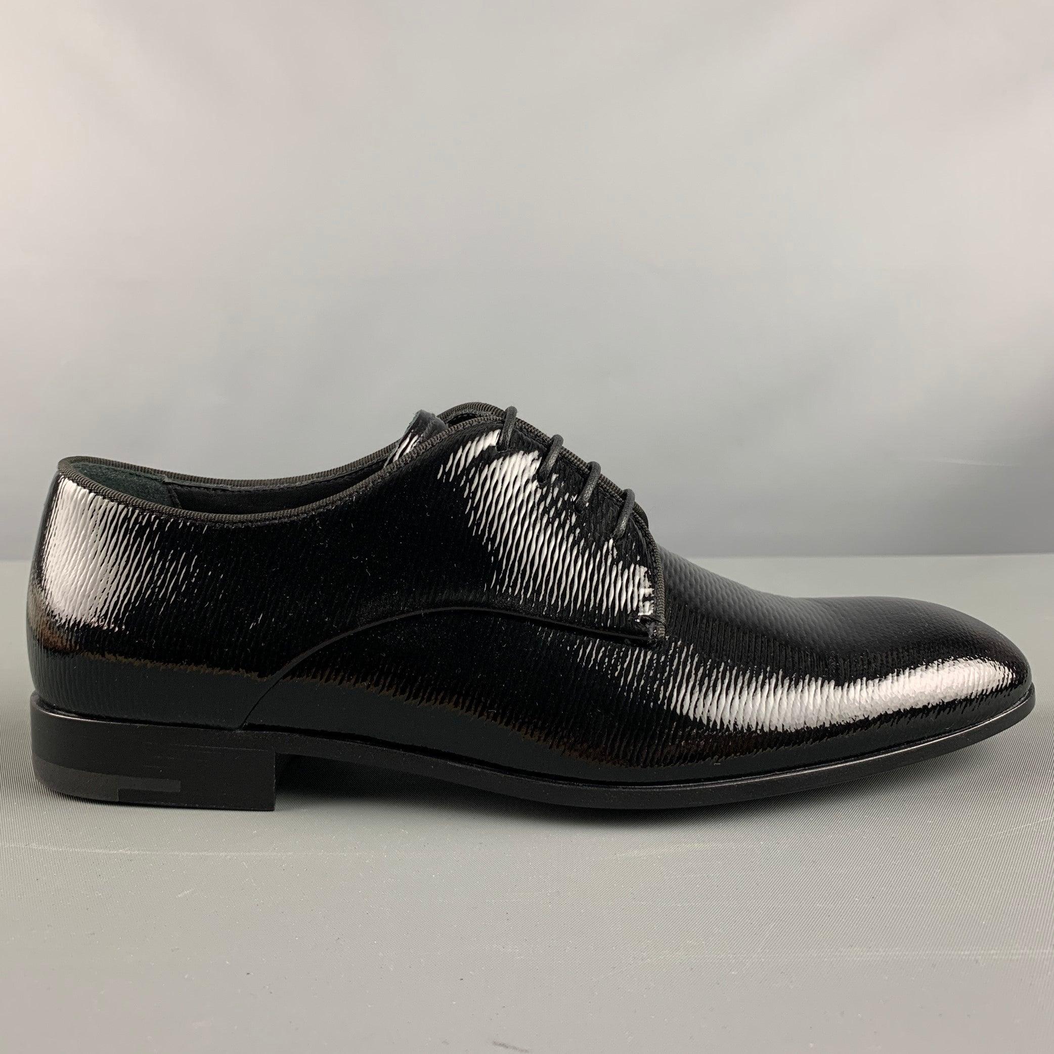 GIORGIO ARMANI shoes comes in a black patent leather featuring a lace up closure. Includes Box. Made in Italy. Excellent Pre-Owned Condition. 

Marked:   5Outsole: 11 inches  x 3.75 inches  
  
  
 
Sui Generis Reference: 129811
Category: Lace Up