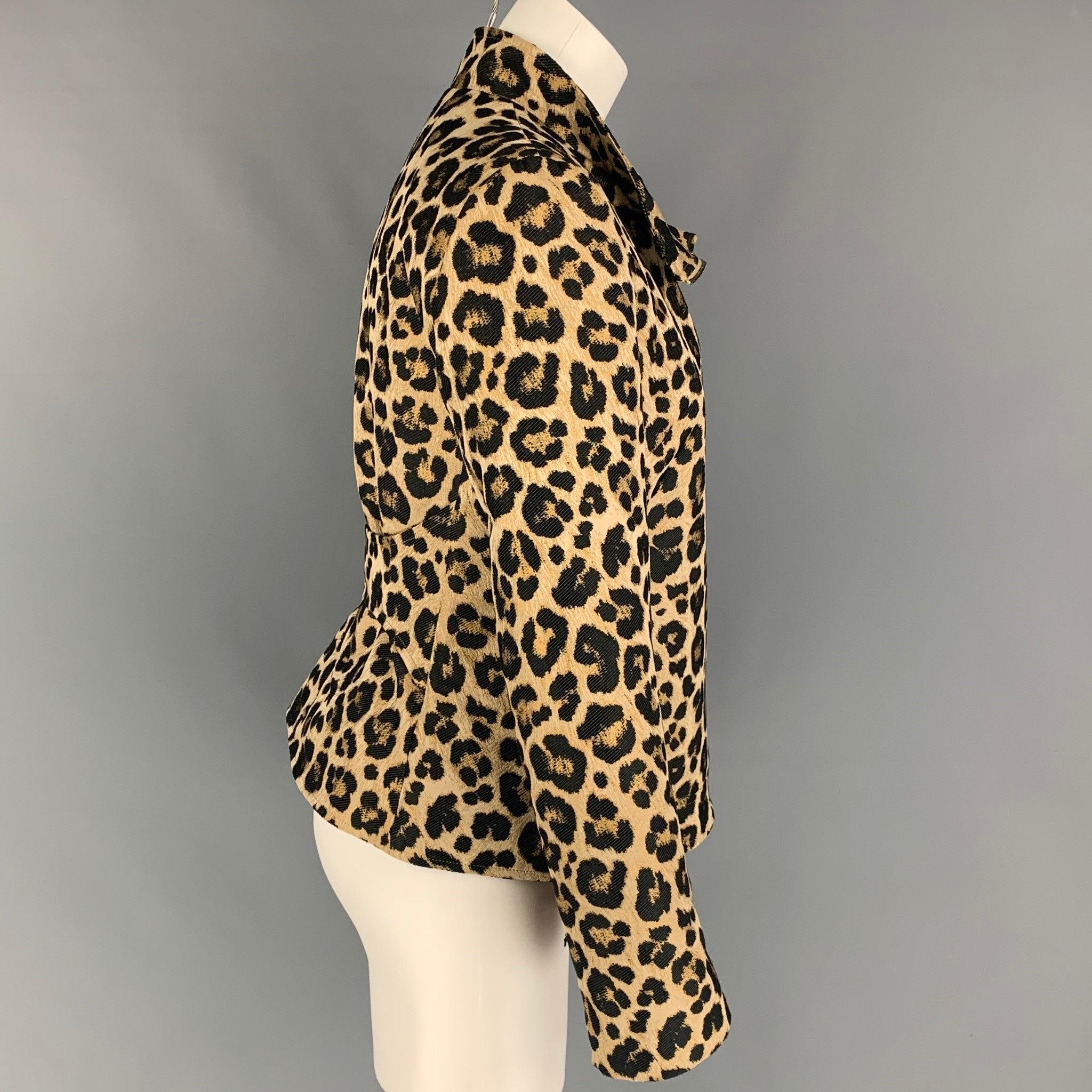 GIORGIO ARMANI jacket comes in a tan & black animal print polyester with a quilted liner featuring a back strap, slit pockets, and a full zip up closure. Made in Italy.
Very Good
Pre-Owned Condition. 

Marked:   42 

Measurements: 
 
Shoulder: 16