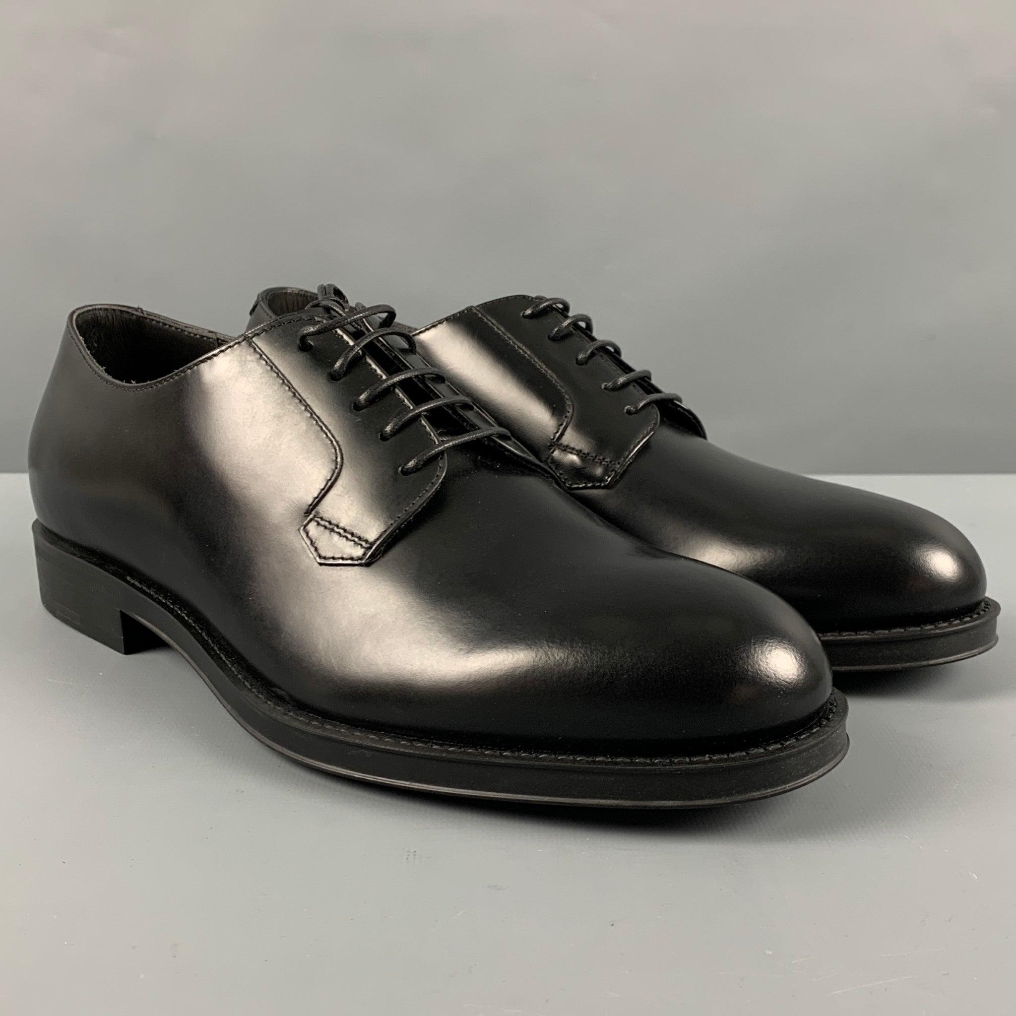 GIORGIO ARMANI shoes
in a black leather fabric featuring lace-up closure. Comes with box and dust bag. Made in Italy.New with Box. 

Marked:   X2C594 7Outsole: 11.5 inches  x 4.25 inches 
  
  
 
Reference: 127517
Category: Lace Up Shoes
More