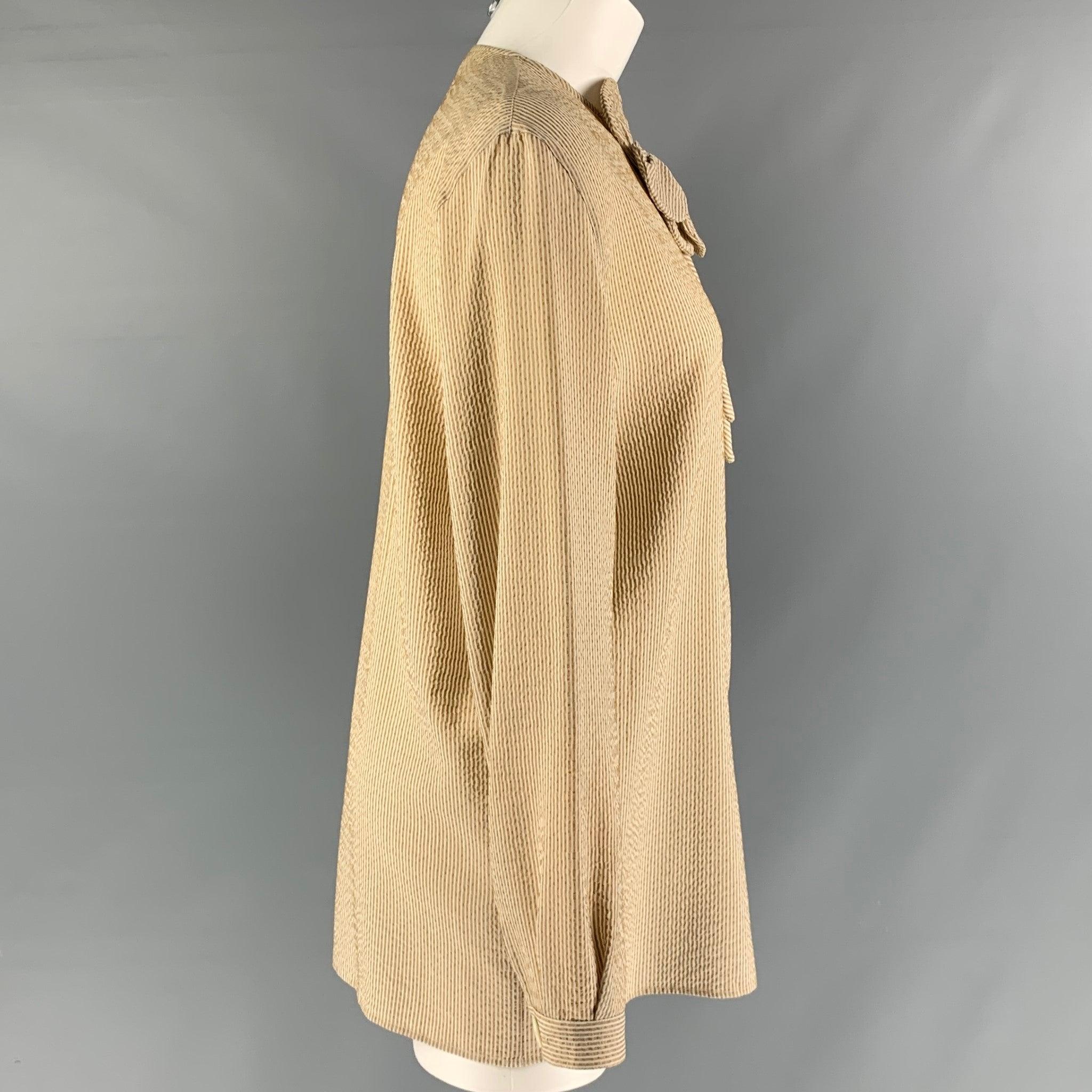 GIORGIO ARMANI vintage long sleeve blouse comes in beige striped silk features a handmade fabric flower detail at front and button down closure. Made in Italy.Excellent Pre-Owned Condition.  
 

 Marked:  42 
 

 Measurements: 
  
 Shoulder: 16