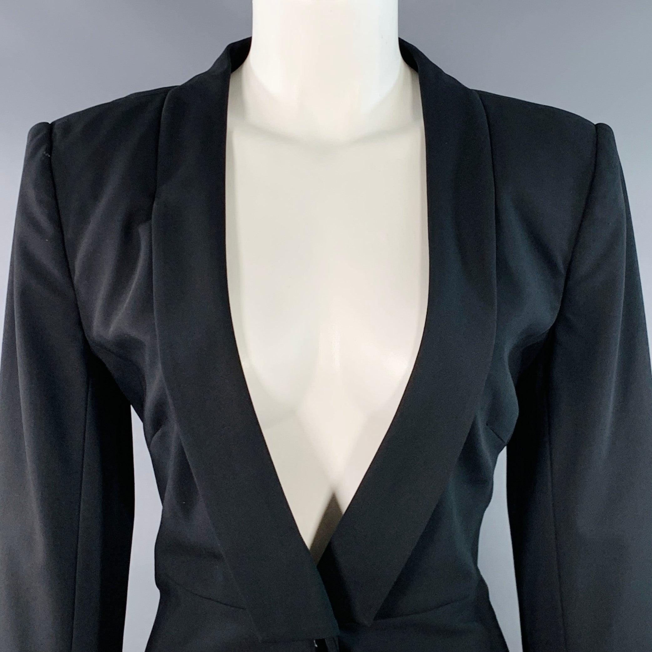 GIORGIO ARMANI blazer
in a black virgin wool featuring a shawl collar, slight peplum waist, and single toggle closure. Made in Italy.Excellent Pre-Owned Condition. 

Marked:   IT 44 

Measurements: 
 
Shoulder: 15.25 inches Bust: 35 inches Sleeve: