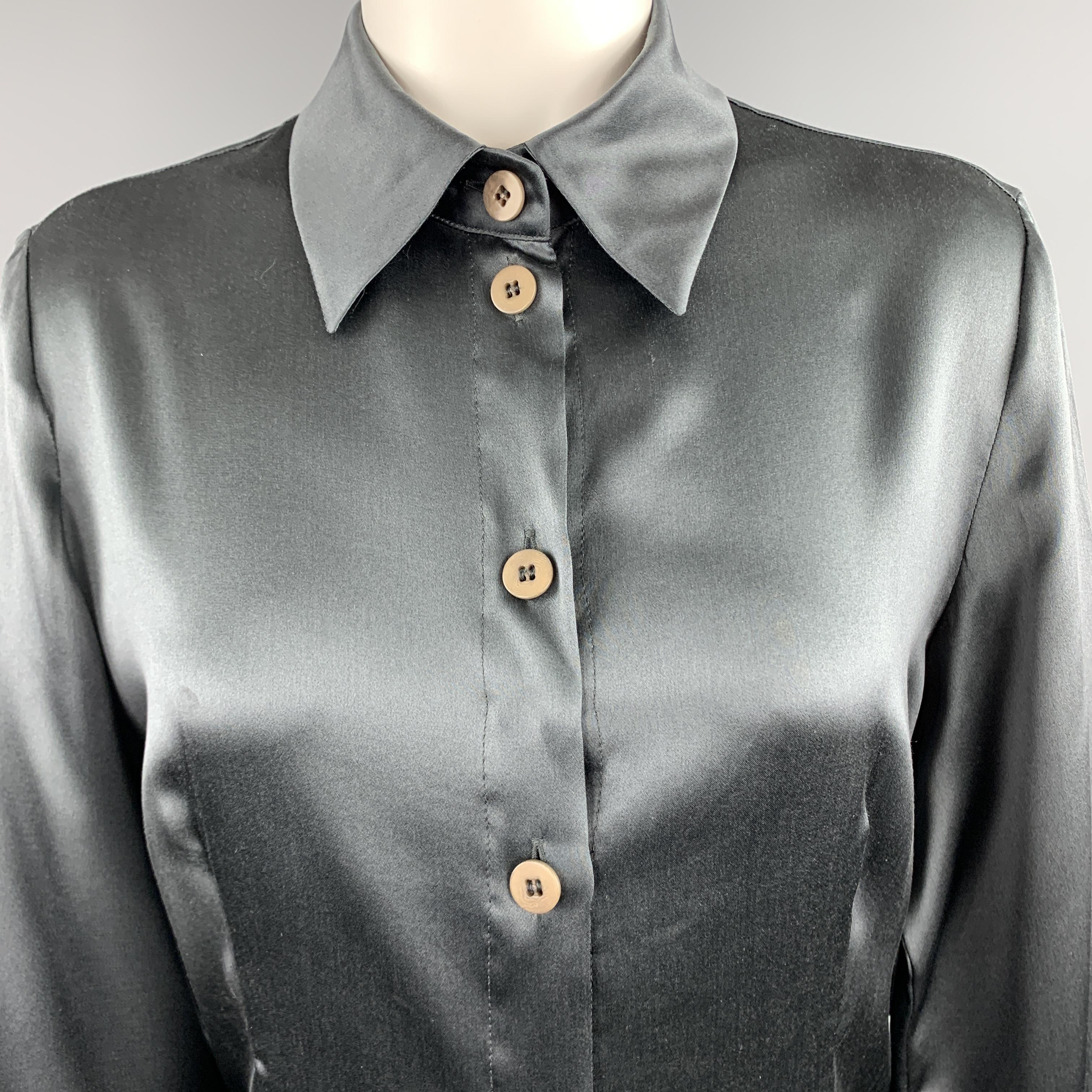 GIORGIO ARMANI COLLEZIONI blouse cme sin charcoal silk satin with a pointed collar and button front. Made in Italy.

Excellent Pre-Owned Condition.
Marked: Us 8

Measurements:

Shoulder: 14 in.
Bust: 40 in.
Sleeve: 24 in.
Length: 27 in.