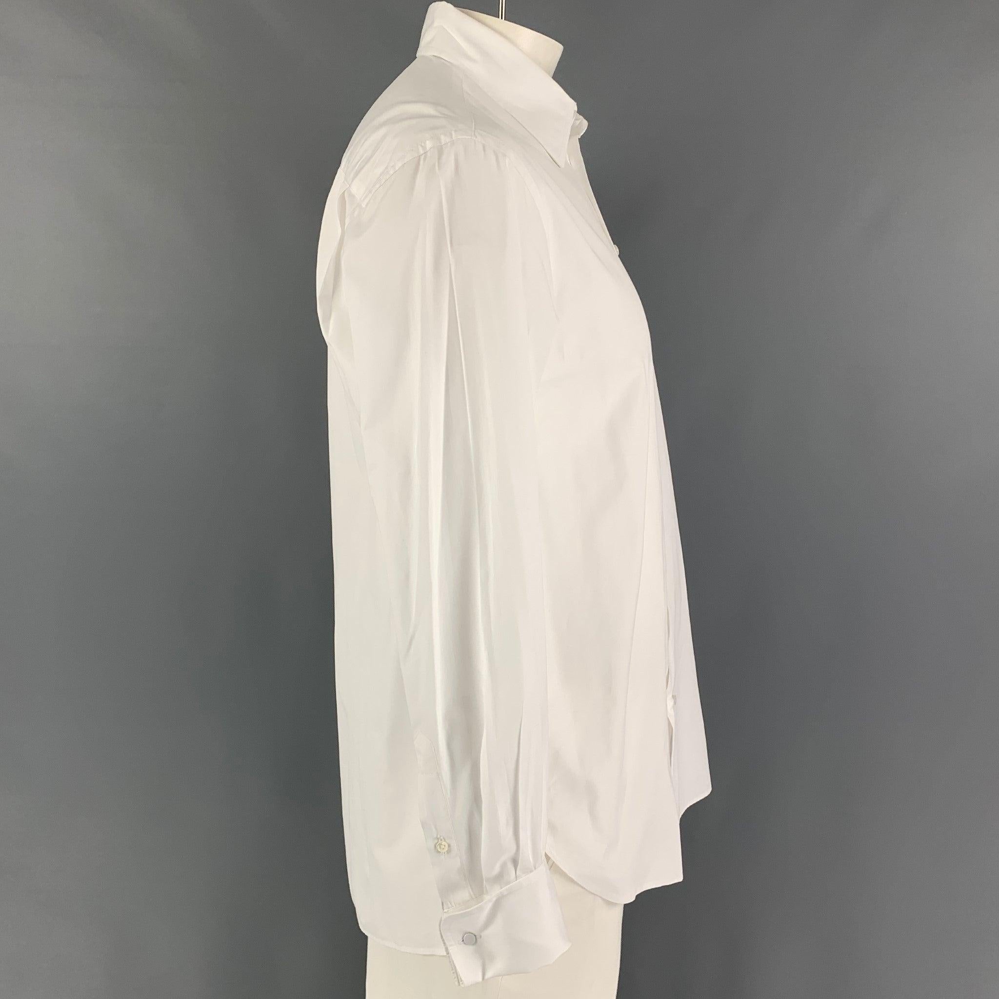 GIORGIO ARMANI long sleeve shirt comes in a white cotton featuring a classic style, spread collar, french cuffs, and a button up closure. Cufflinks not included. Made in Italy. Excellent Pre-Owned Condition. 
 

 Marked:  40/15 3-4 
 

