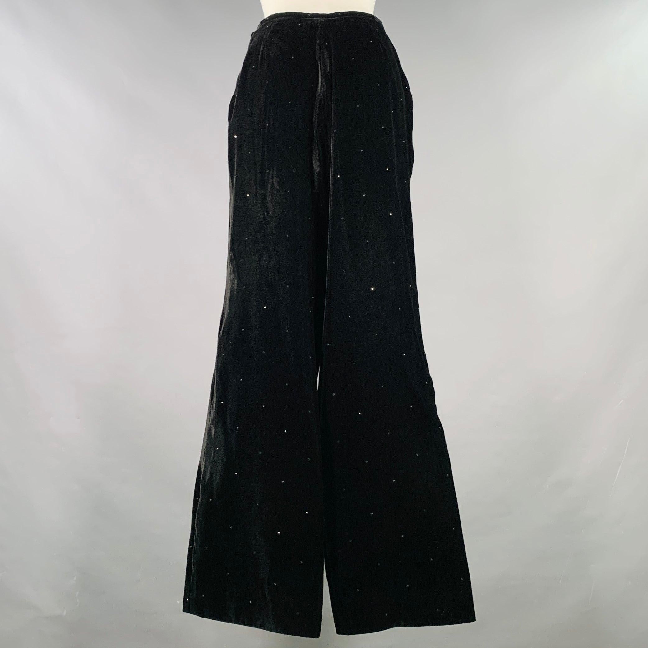 GIORGIO ARMANI casual pants
in a black velvet fabric featuring all over micro rhinestone pattern, wide leg, and side zipper closure. Excellent Pre-Owned Condition. Fabric and care tags removed. 

Marked:   size not marked 

Measurements: 
  Waist: