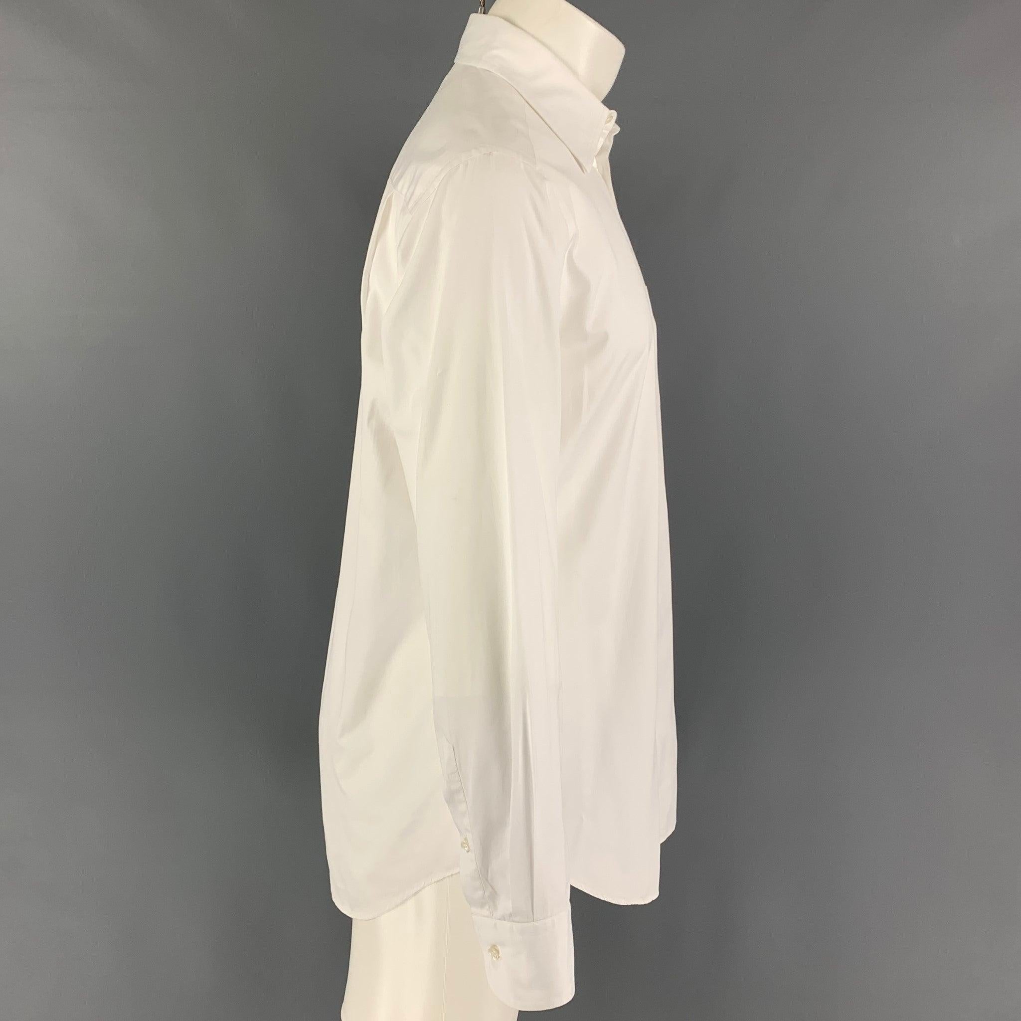 GIORGIO ARMANI long sleeve shirt comes in a white cotton featuring a classic style, spread collar, patch pocket, and a button up closure. Made in Italy.
 Good Pre-Owned Condition. Light discoloration at front & sleeve. As-is.  
 

 Marked:  39/15.5