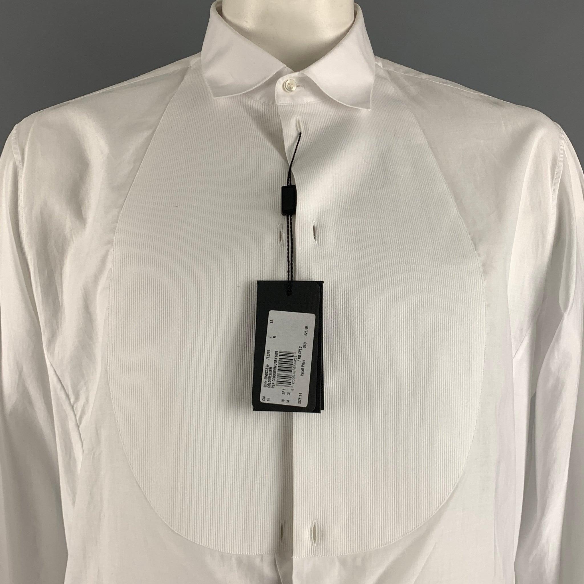 GIORGIO ARMANI long sleeve shirt comes in a white cotton featuring a tuxedo style, french cuffs, and a buttoned closure. Comes with tags. Made in Italy.
Very Good Pre-Owned Condition. Missing four tux buttons. 

Marked:   44/17.5 

Measurements: 
