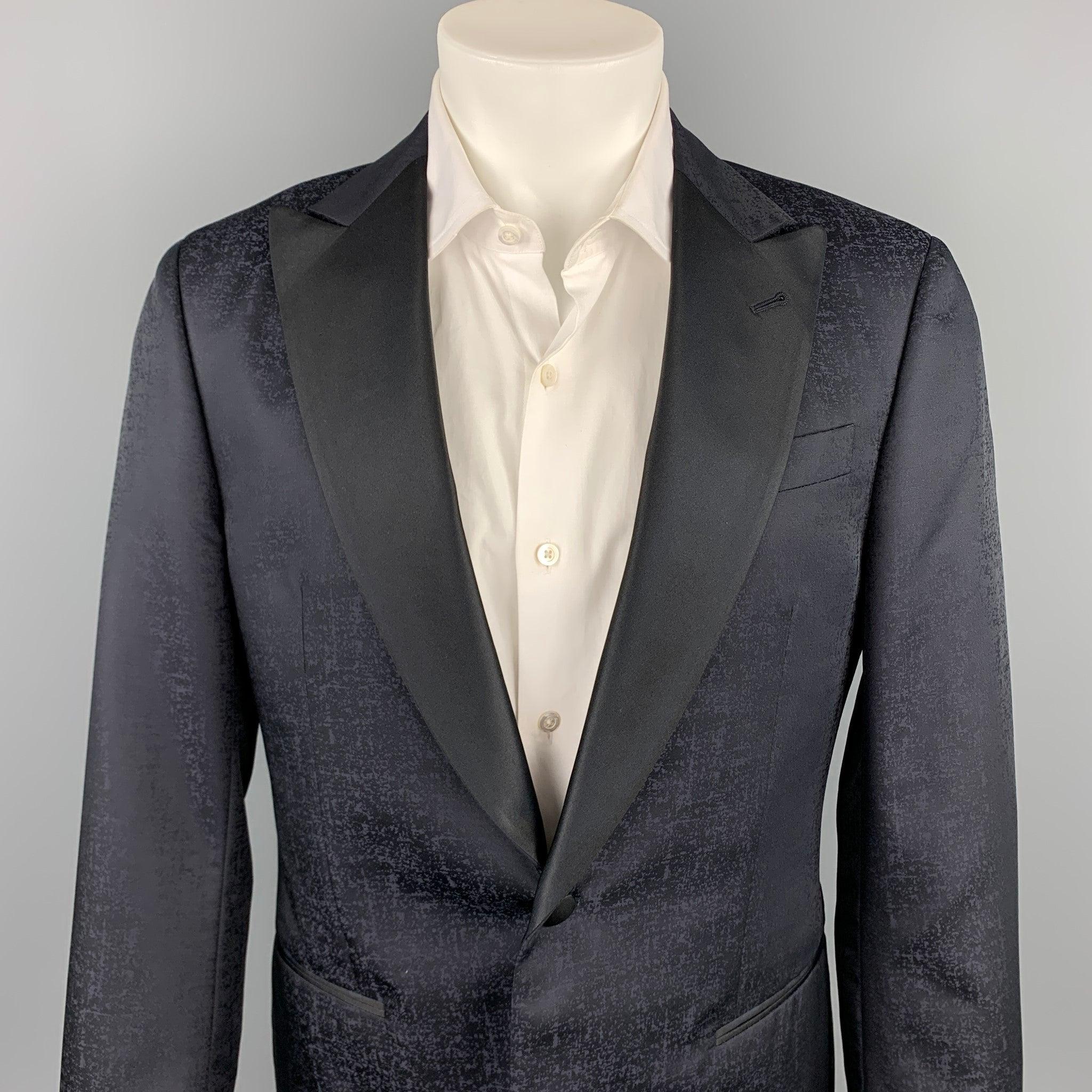 GIORGIO ARMANI sport coat comes in a black marbled wool / silk with a full liner featuring a peak lapel, slit pockets, and a single button closure. Made in Italy.
Very Good
Pre-Owned Condition. 

Marked:   IT 48 R  

Measurements: 
 
Shoulder: 18