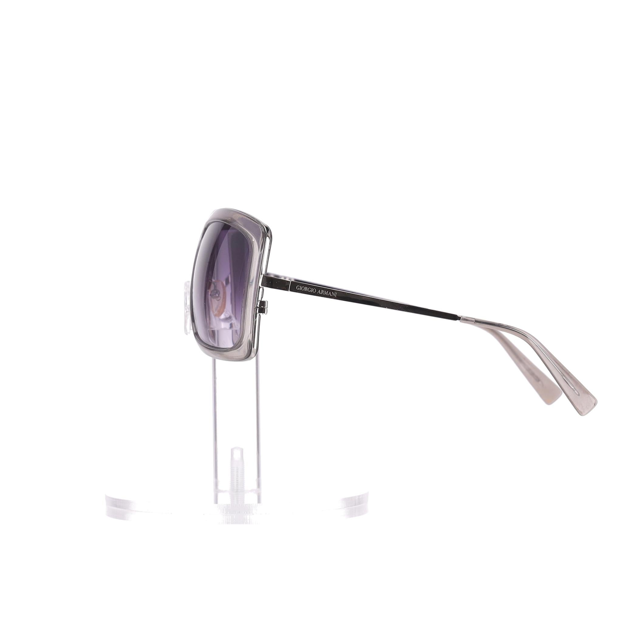 Giorgio Armani Square Sunglasses

Silver square framed sunglasses with purple, gradient lenses.

Metal arms with 'Giorgio Armani' engravement to the side.

Providing 100% UV protection.

Rrp Approx. £280

Size – One Size

Condition – Very Good (Some
