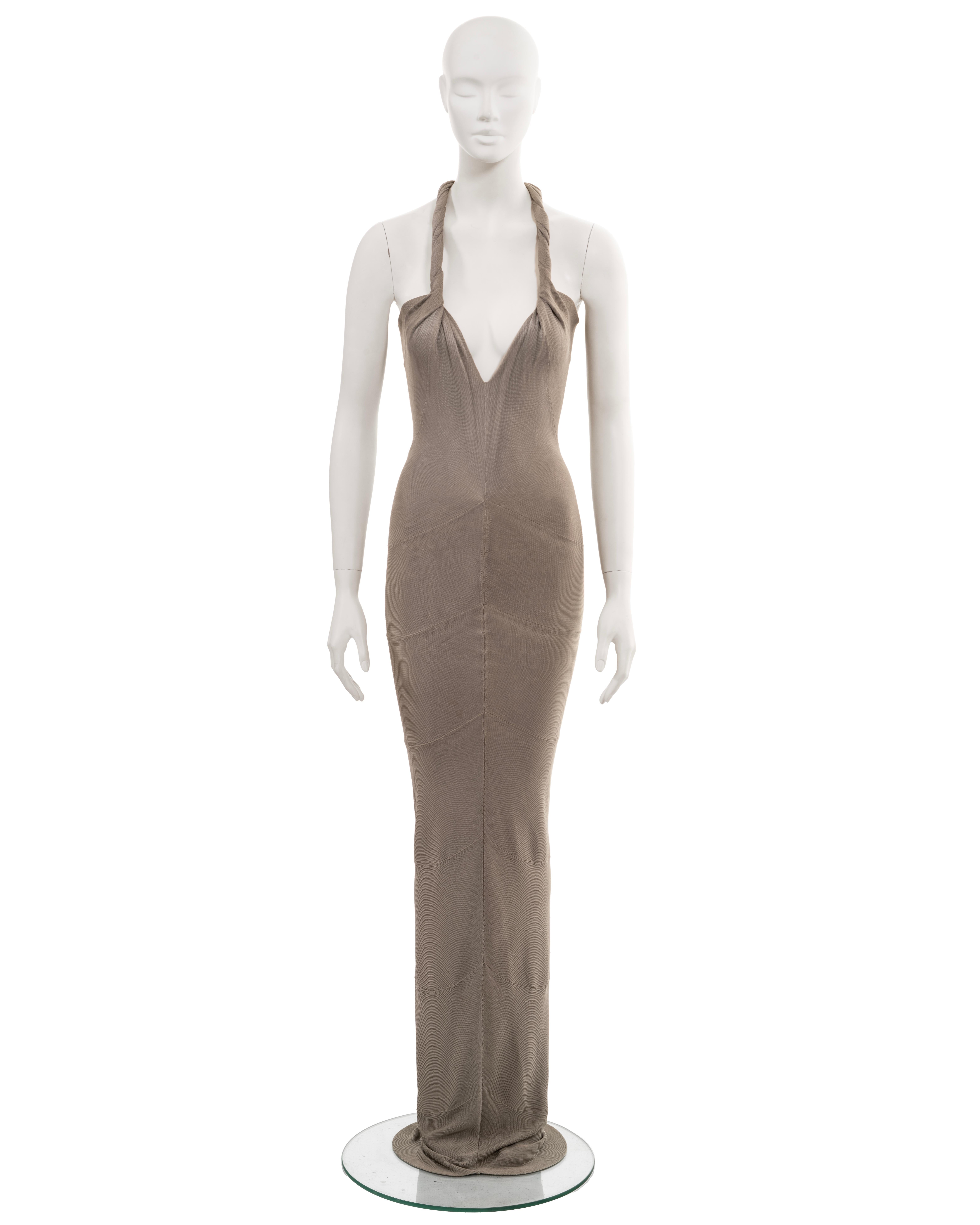 ▪ Giorgio Armani bandage evening dress
▪ Spring-Summer 2006
▪ Stone-grey jersey 
▪ Plunging v-neck
▪ Twisted shoulder straps 
▪ Figure-hugging 
▪ Multi-panelled floor-length wiggle skirt
▪ IT42 - FR38 - UK10 - US6 (runs small)
▪ Made in Italy

All