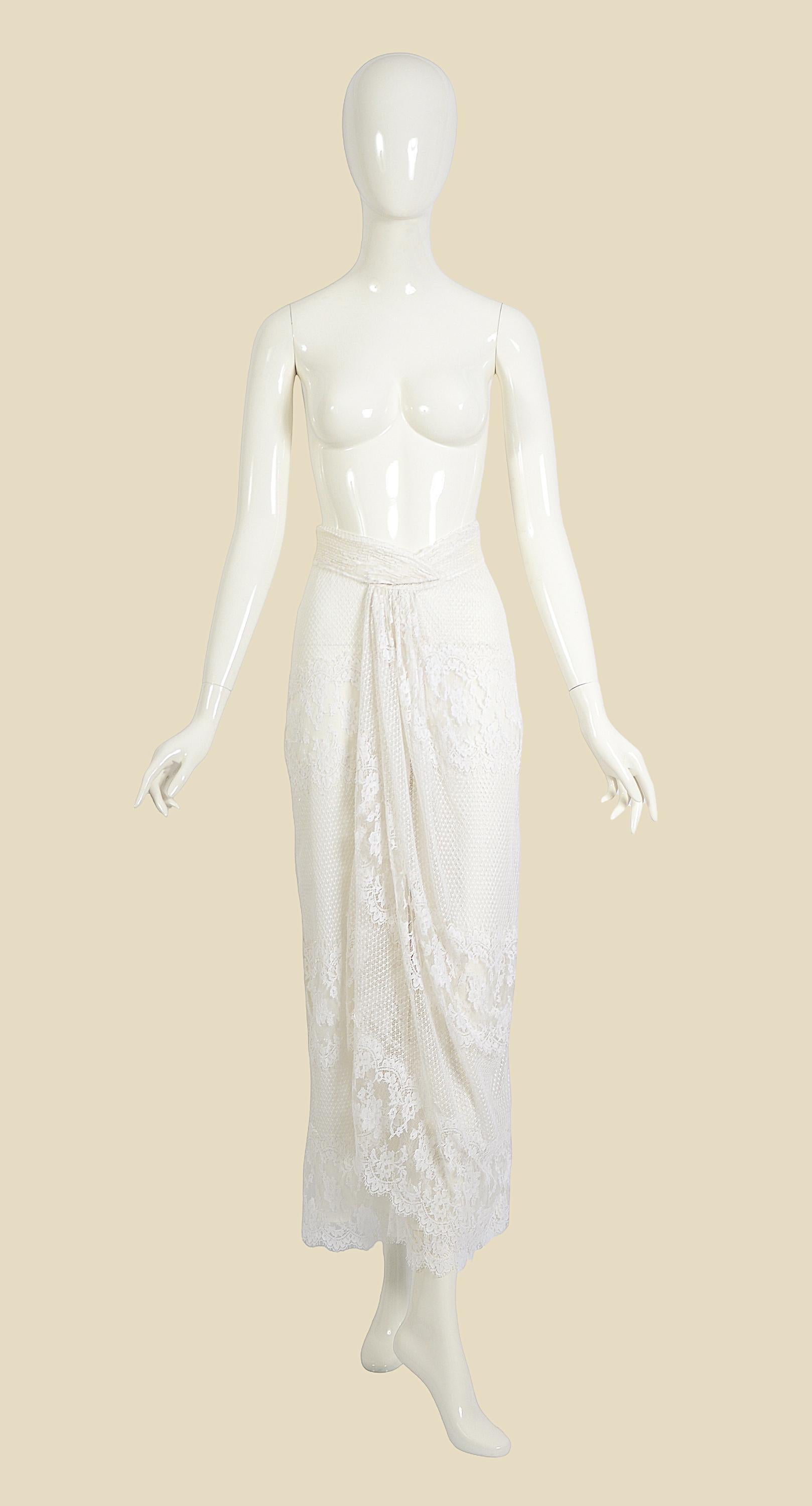 Giorgio Armani vintage 1980s white cotton lace draped skirt:pants 
This vintage 1980s Giorgio Armani cotton lace piece is a timeless treasure, featuring a stunning lace-draped skirt effect at the front of the trousers. The pants underneath, a layer