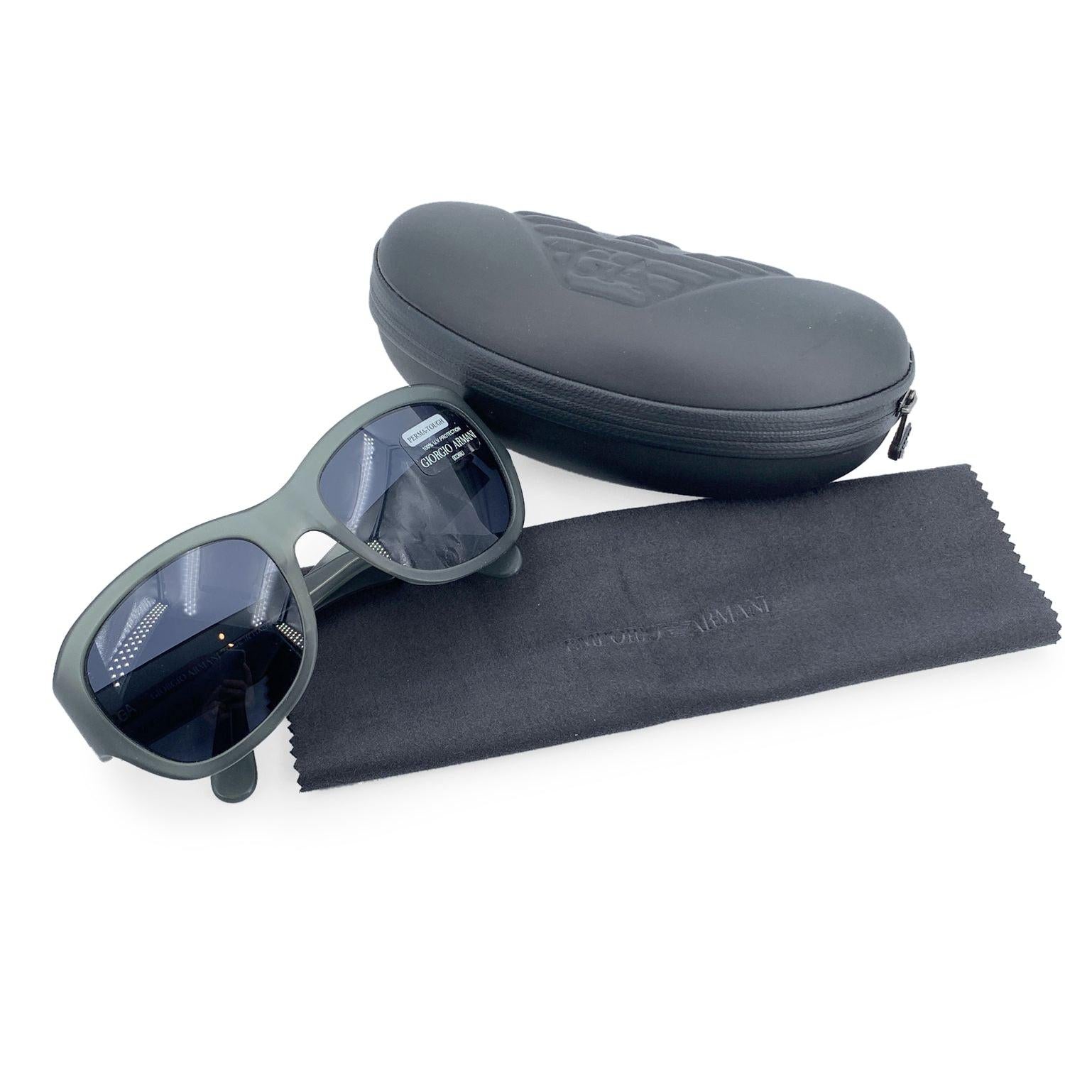 Vintage Giorgio Armani Sunglasses, Mod. 842 - 166-S/61 - 125. Grey acetate rounded square shaped frame. Blue Perma-Tough lenses with 100% UV protection. Made in Italy. Details MATERIAL: Plastic COLOR: Grey MODEL: 842 GENDER: Unisex Adults COUNTRY OF