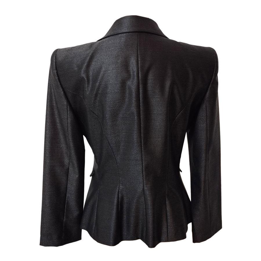 Vintage Wool (60%) silk (30%) nylon and elasthane Dark grey color Button closure Two pockets Shoulder/hem length cm 54 (212 inches) Shoulder cm 42 (165 inches)    