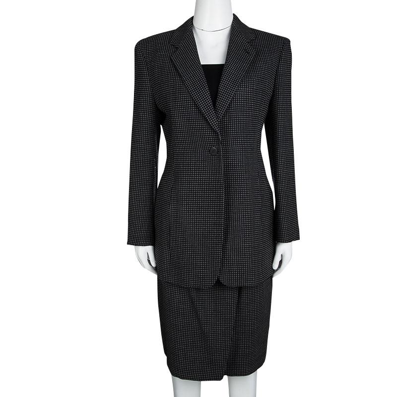 It's time you got a gorgeous blazer and skirt set and what better than this one from Giorgio Armani. The set is tailored from the finest materials and features a dotted design. The blazer comes with a front button, long sleeves and the skirt comes